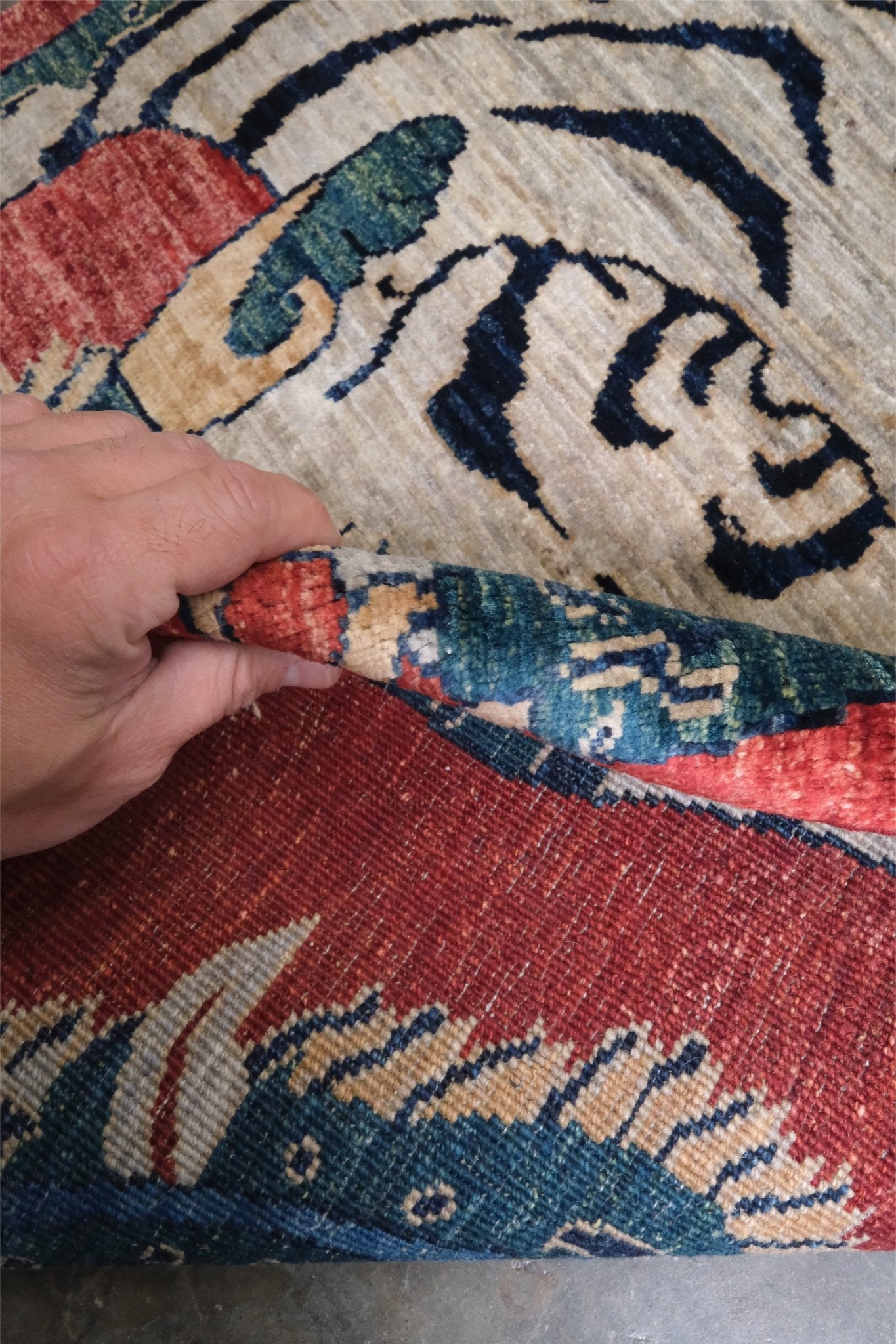 Brand new Tibetan tiger rug with rust red, ivory tiger, teal blue, handmade wool accent rug 3x5 from Indigo Rugs Burlingame Bay Area.