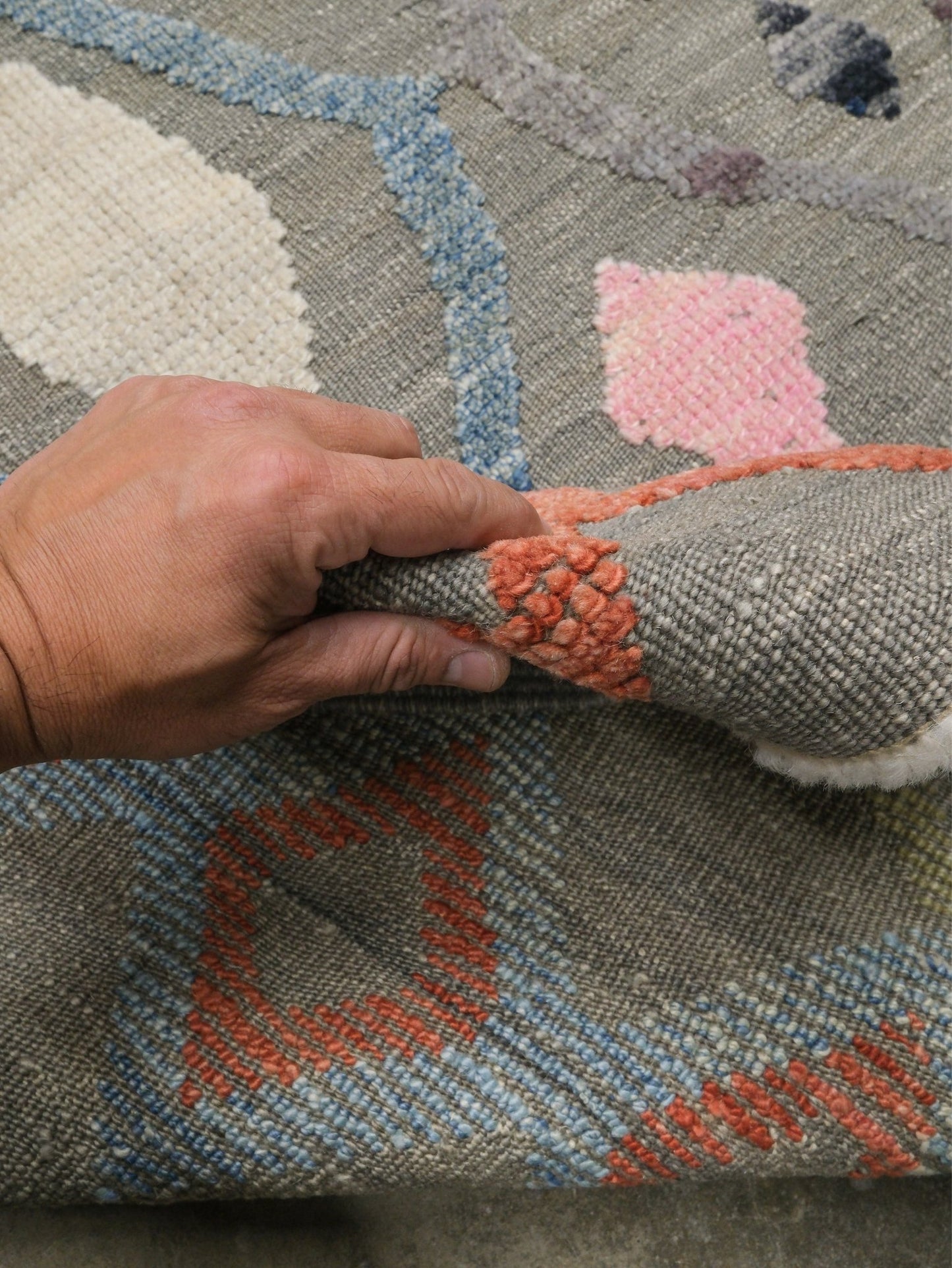 Warm gray vibrant modern Turkish Tulu rug with colorful raised diamond motifs, 3D wool pile texture, handmade wool area rug 9x12 from Indigo Rugs Burlingame Bay Area.