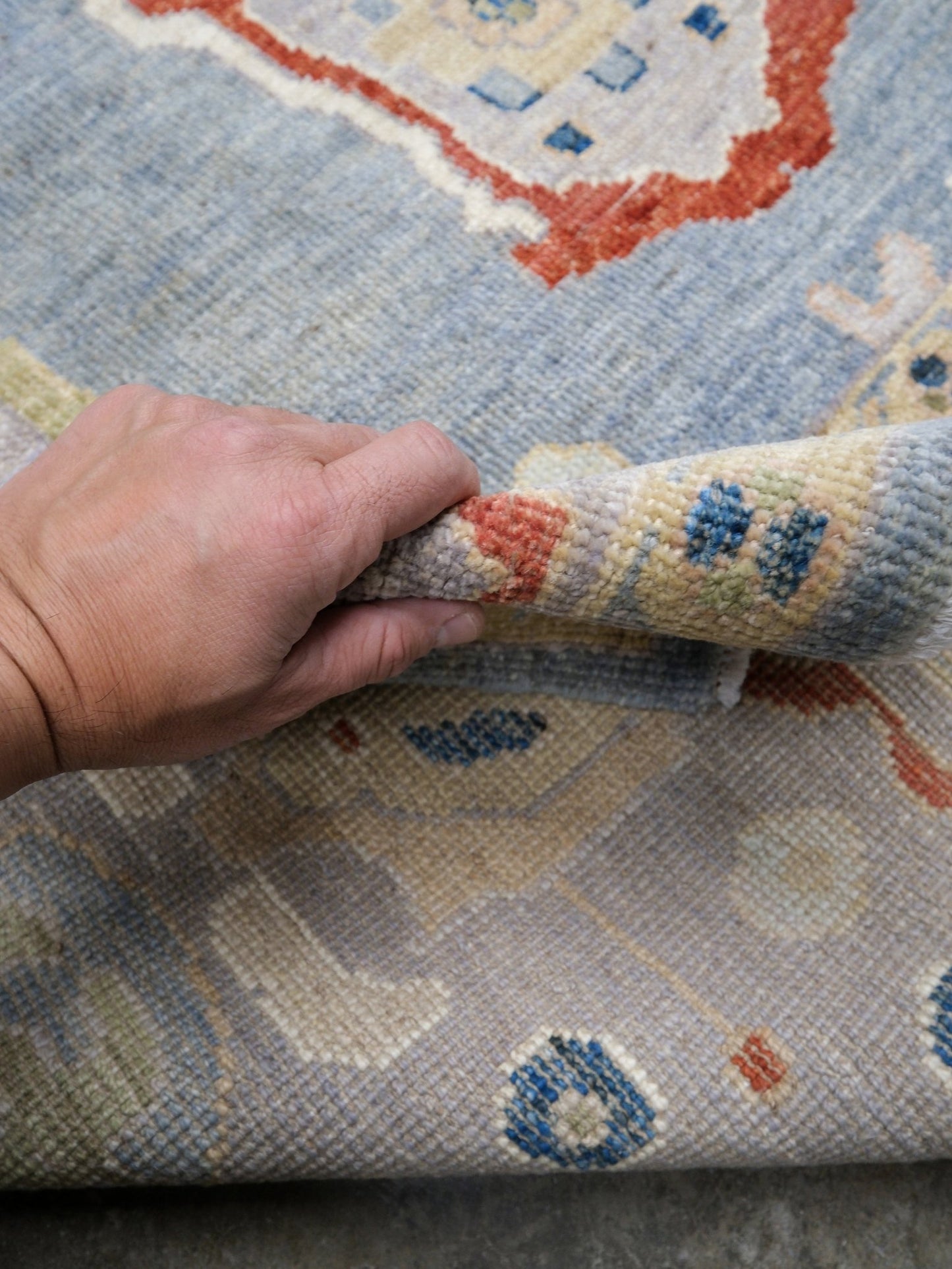 Powder blue Turkish Oushak rug with pale lavender border, warm ivory floral motifs, hand-knotted wool area rug 8x10 from Indigo Rugs Burlingame Bay Area.