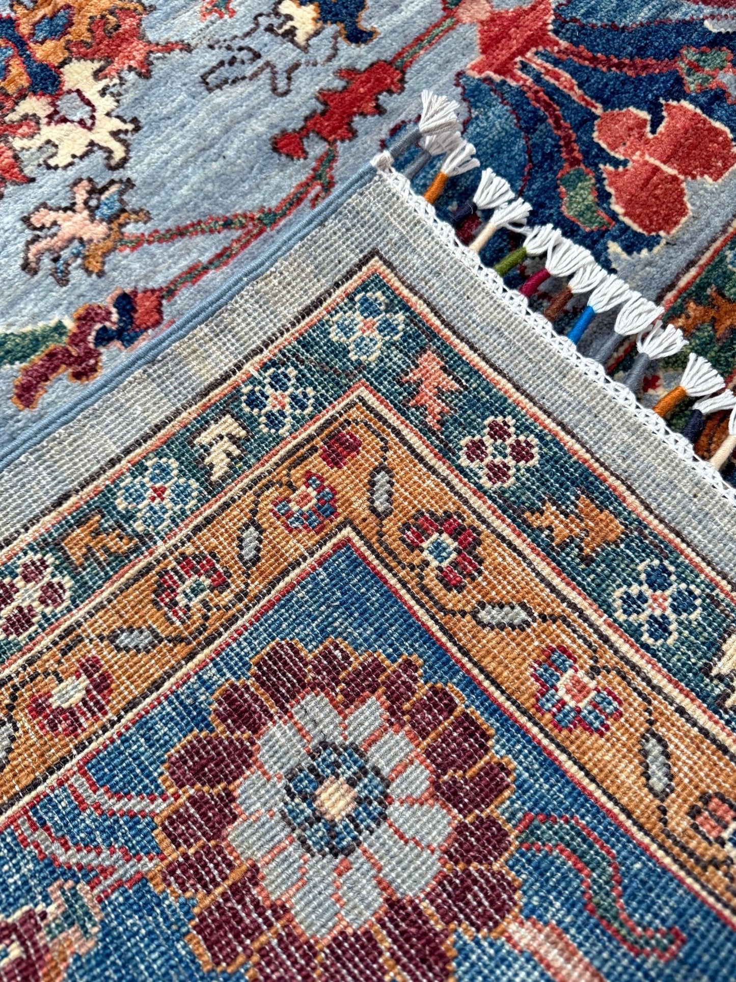 9x12 handmade luxury floral rug with dusty blue background and rich cobalt border, exclusive to the best rug shop in Burlingame CA, SF Bay Area – perfect for bedroom, living room, or dining room décor, with free shipping included.