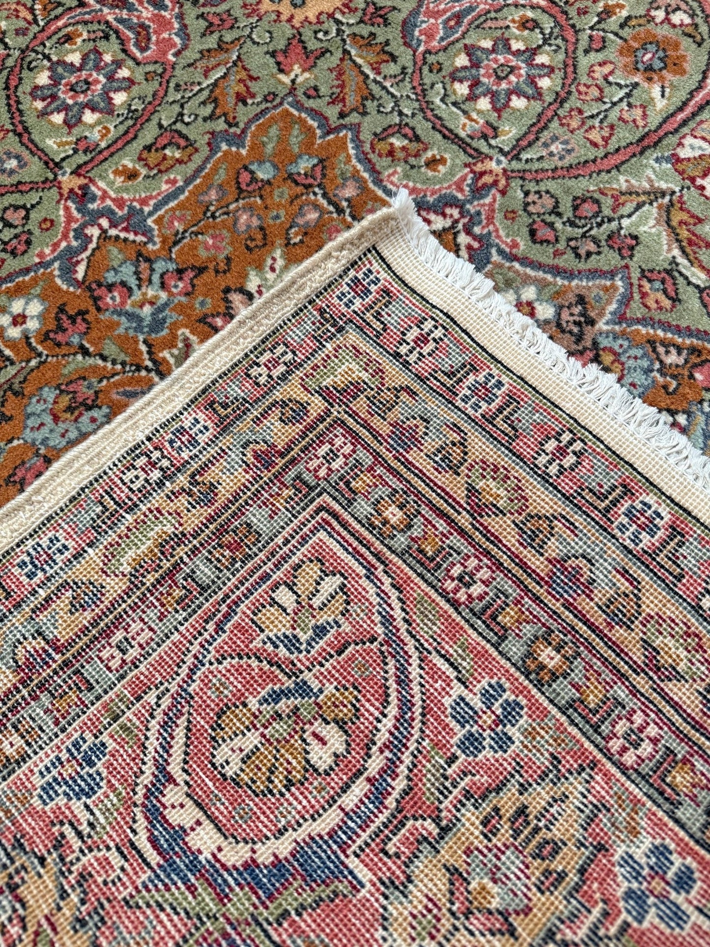 Pink and brown vintage Turkish rug. This luxurious 9x12 handmade wool carpet is available in Burlingame CA SF Bay Area with free shipping, perfect for adding a touch of elegance to any home decor.