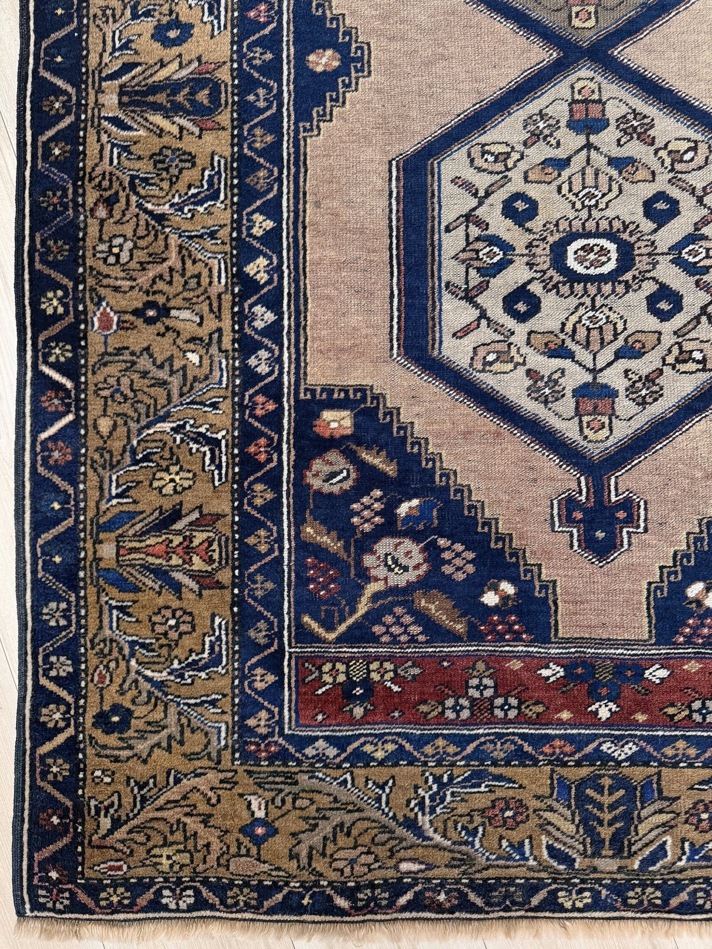 4x8 Vintage Yahyali Turkish wool rug with hexagonal medallions camel beige navy. Perfect for bedroom, living room, or kitchen. One-of-a-kind rug from Indigo Rugs in Burlingame, the best rug shop in the San Francisco Bay Area. Free shipping