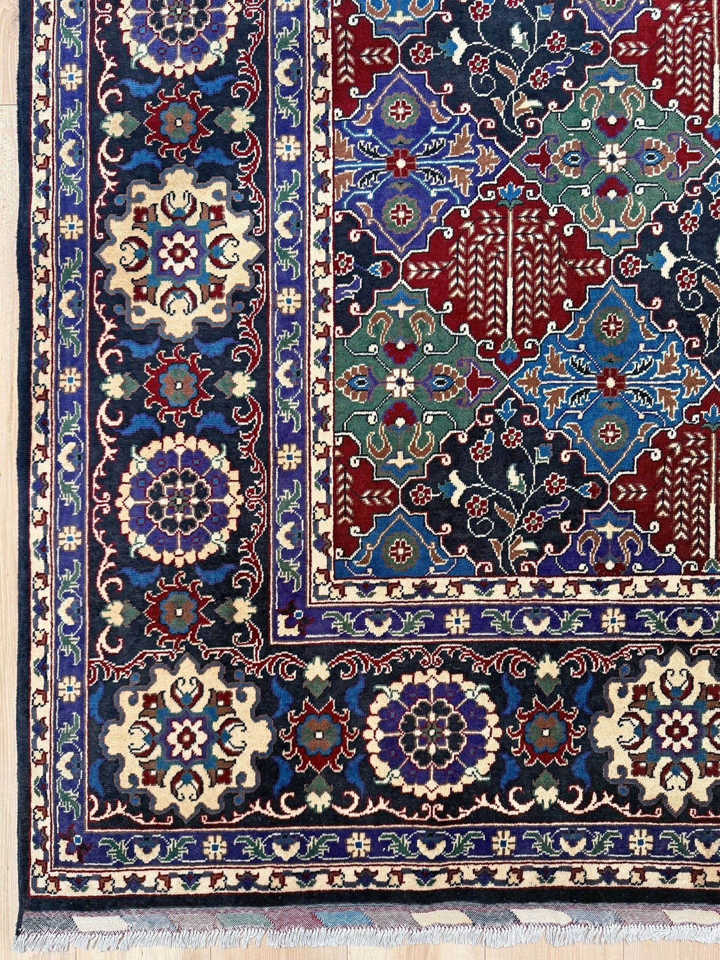 9x12 High-quality vintage rug with rich navy, burgundy, and cerulean hues, featuring intricate floral medallions and a velvety Merino wool pile. Perfect for adding character to your bedroom, living room, or dining area. Shop now for timeless elegance and expert craftsmanship. Best Rug Shop in San Mateo, SF Bay Area – Free Shipping