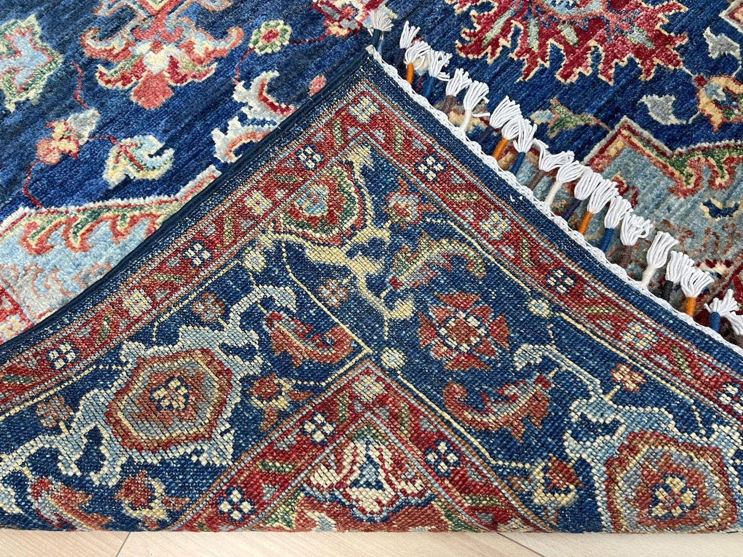 Heriz Persian rug in deep indigo, red, and cream with a bold geometric medallion, from the best luxury handmade rug shop in the San Francisco Bay Area. Perfect scatter rug or accent rug for living room, bedroom, kitchen, or nursery. Free shipping available for this exquisite handmade Persian rug.