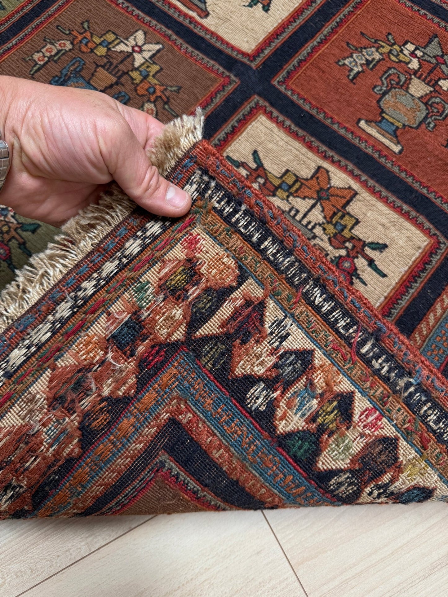 Handmade 3x5 Armenian Soumak rug wall hanging with vase and tree of life design, rich burnt sienna, moss green, denim blue, ivory, and mustard hues on navy ground — available from the best rug shop in San Mateo, SF Bay Area, with free shipping.