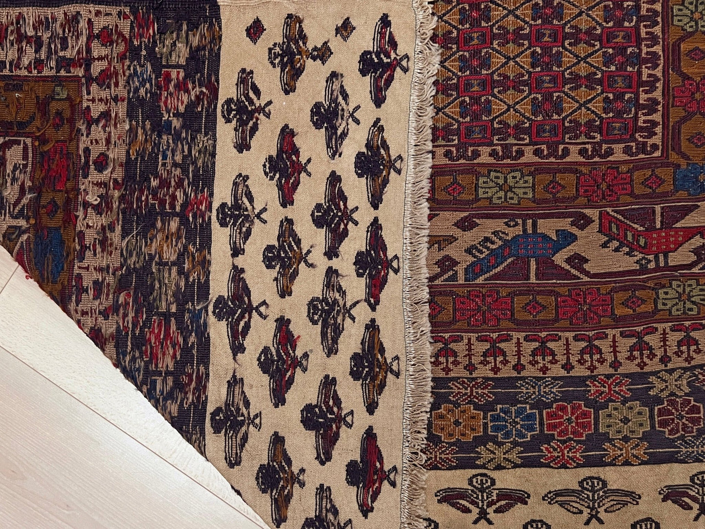 4x6 Vintage Armenian soumak rug with geometric motifs and stylized birds in burgundy, navy, ivory. Scatter handmade wool rug for living room, bedroom, study under coffee table. Vintage rug shop SF bay area burlingame ca.