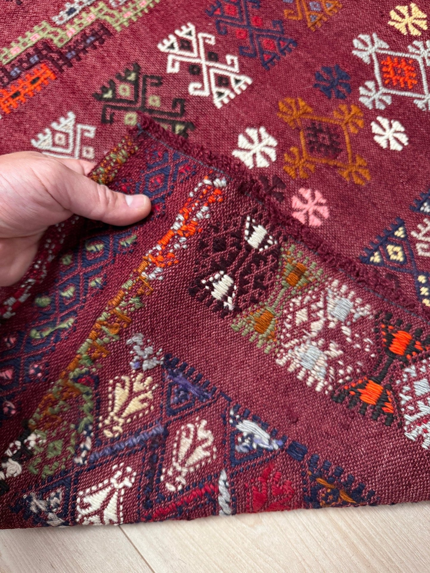 6x9 vintage Turkish Double Wing Cicim kilim rug from Konya with embroidered tribal motifs in pomegranate, rust, and saffron hues — perfect for bedroom, living room, kitchen, or study. Available at Indigo Rugs, the best rug shop in San Mateo, SF Bay Area. Free shipping included