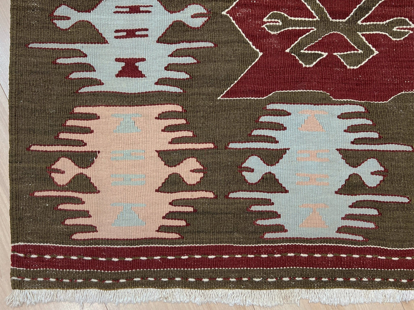 4x6 Vintage Afyon Turkish kilim flatweave rug with maroon field, olive green borders, and tribal scorpion and comb motifs — handmade wool wall hanging, available at Indigo Rugs, the best rug shop in San Francisco Bay Area, Burlingame CA.