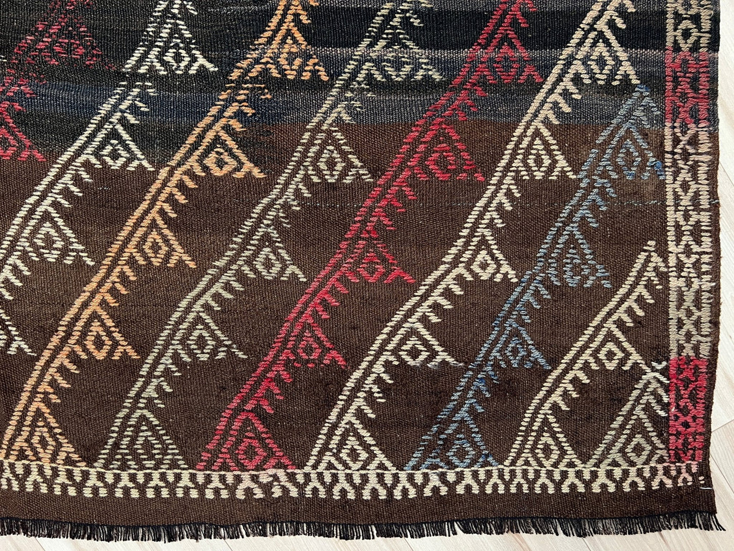 Vibrant kilim rug in living room setting. Distressed vintage turkish kilim rug shop. Flatweave rug Handmade rug shop SF bay area. Oriental rug shop palo alro.