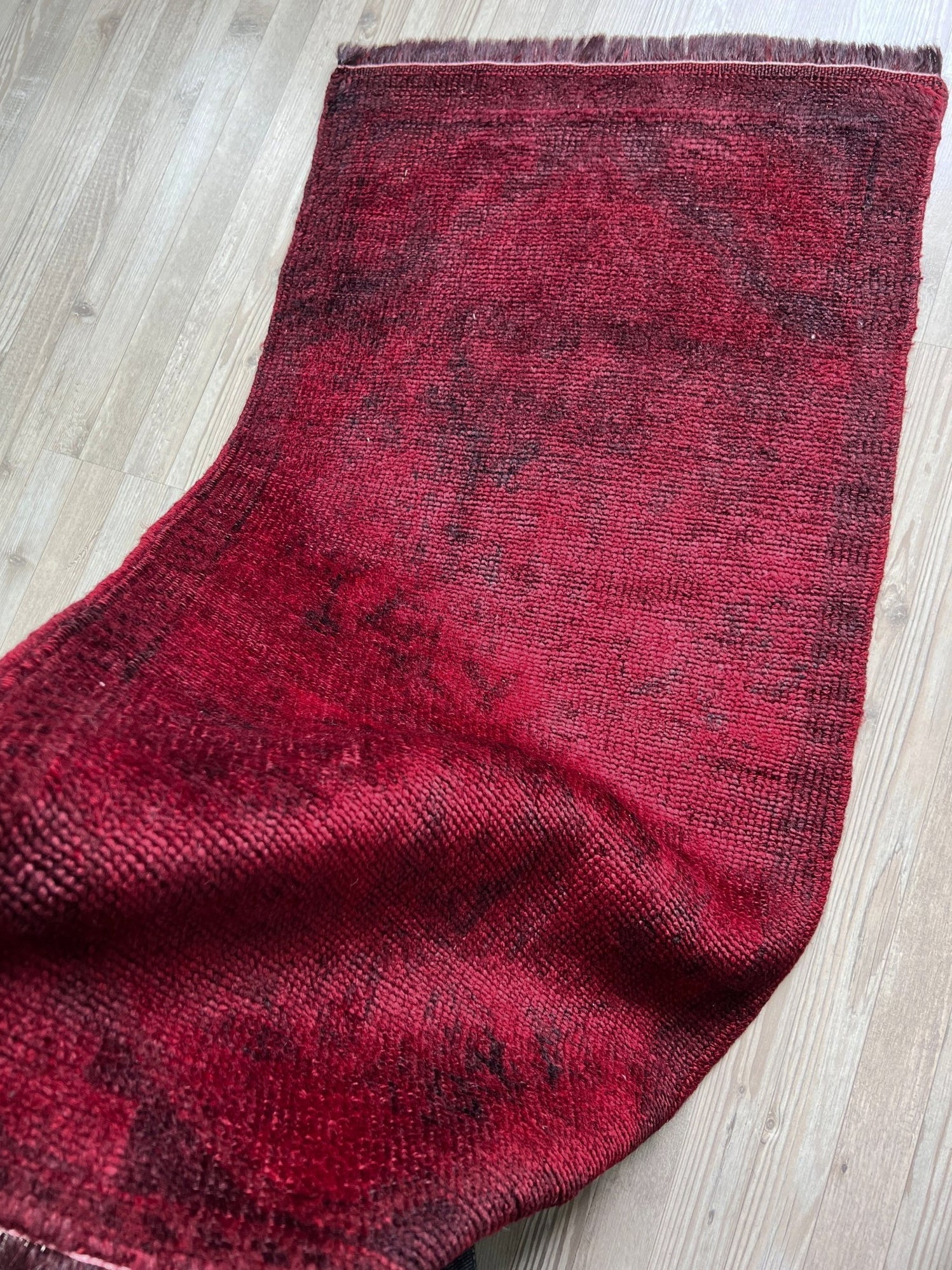 Deep red overdyed Turkish mini rug 20x38 inches, handmade wool, perfect for entryway, kitchen, or bath. Free shipping from Indigo Rugs — best rug shop in the San Francisco Bay Area, Burlingame CA.