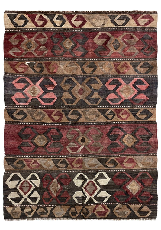 Traditional kilim rug with geometric pattern on a white background. Vintage Eastern Turkish Kars kilim rug with horizontal tribal bands, hooked diamond motifs, and geometric symbols in madder red, walnut brown, 5x7.