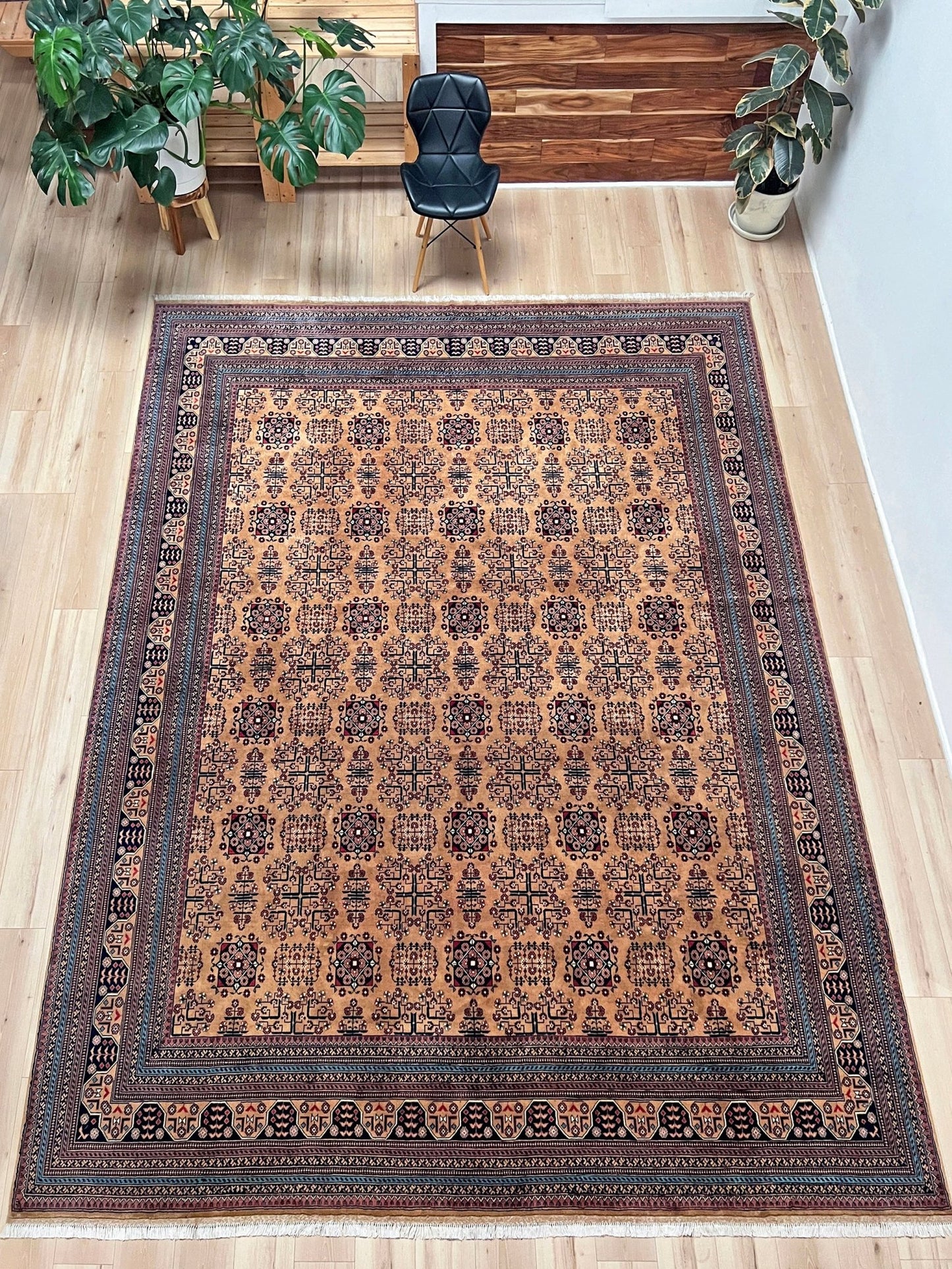 Sand Bilcik Turkmen wool area rug with intricate medallion motifs and ornate indigo and rust borders, perfect for living room, bedroom, or dining room decor. Sold by the best handmade luxury rug shop in the San Francisco Bay Area.