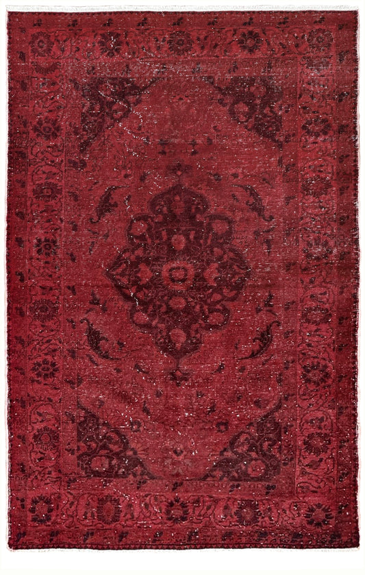A square red oriental rug with a distressed, vintage-style pattern featuring a central medallion and dark brown corner accents. Moody red overdyed Turkish rug with distressed vintage pattern, deep burgundy red field, tonal medallion and border design, handmade wool accent rug 5x7 from Indigo Rugs Burlingame Bay Area