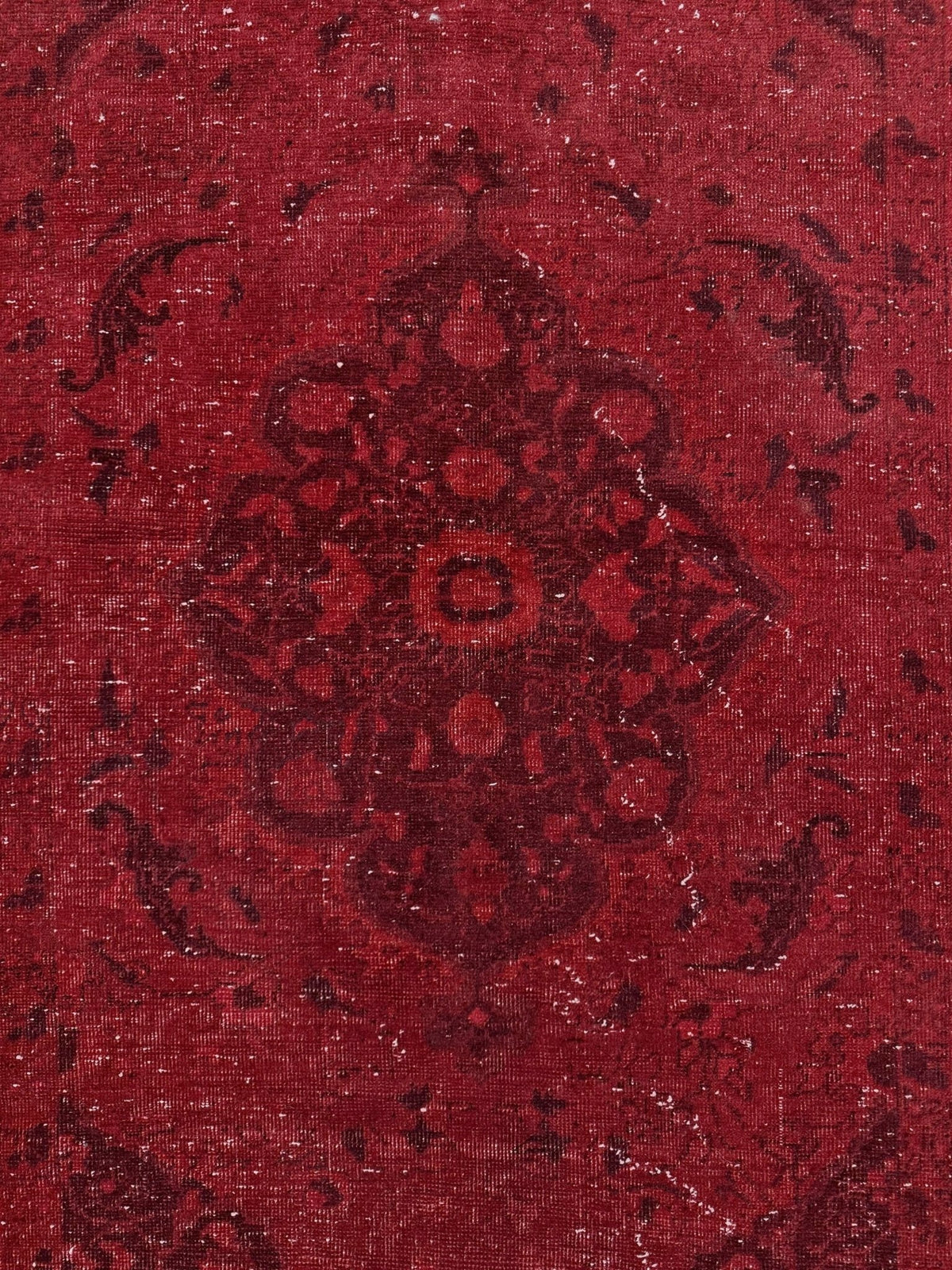 Moody red overdyed Turkish rug with distressed vintage pattern, deep burgundy red field, tonal medallion and border design, handmade wool accent rug 5x7 from Indigo Rugs Burlingame Bay Area