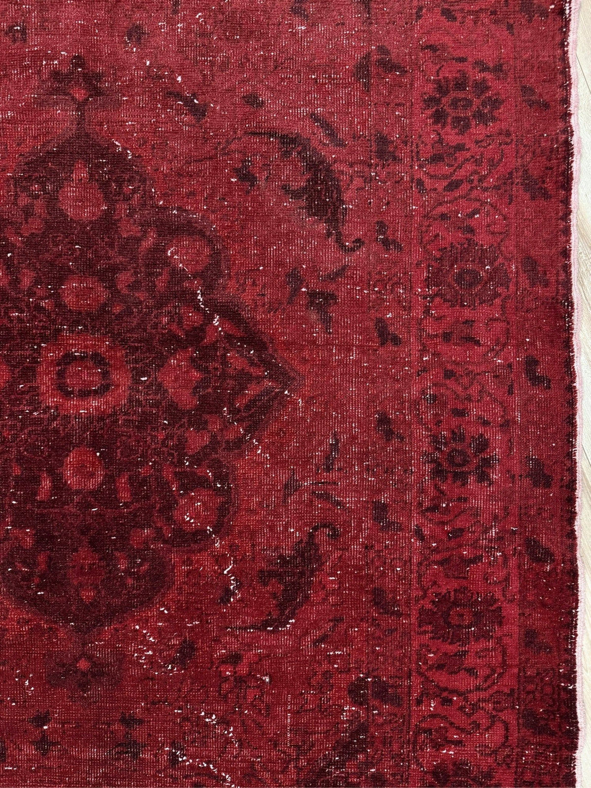 Moody red overdyed Turkish rug with distressed vintage pattern, deep burgundy red field, tonal medallion and border design, handmade wool accent rug 5x7 from Indigo Rugs Burlingame Bay Area