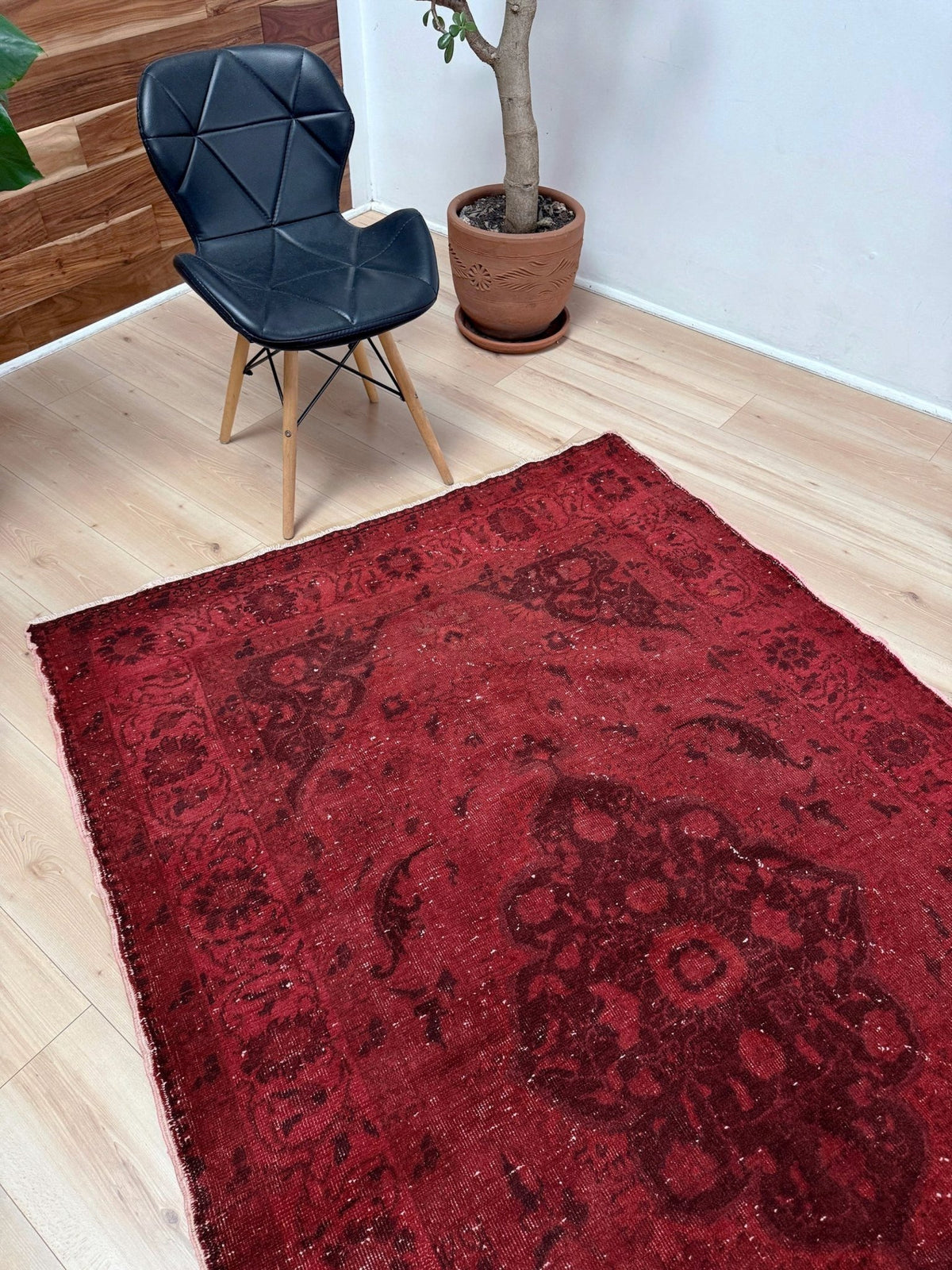 Moody red overdyed Turkish rug with distressed vintage pattern, deep burgundy red field, tonal medallion and border design, handmade wool accent rug 5x7 from Indigo Rugs Burlingame Bay Area