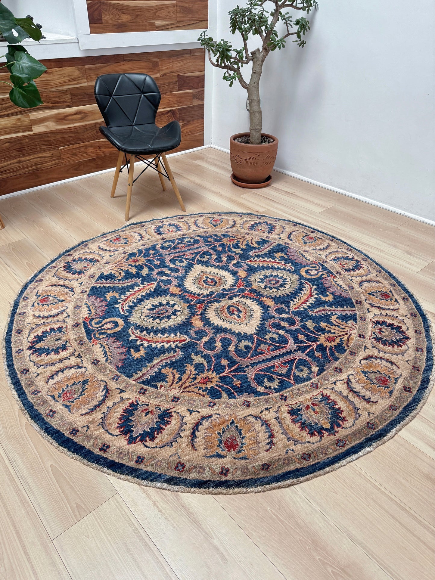 Round Oushak rug with blue field, beige border, muted gold, dusty red floral details, handmade wool 6x6 round area rug from Indigo Rugs Burlingame Bay Area.