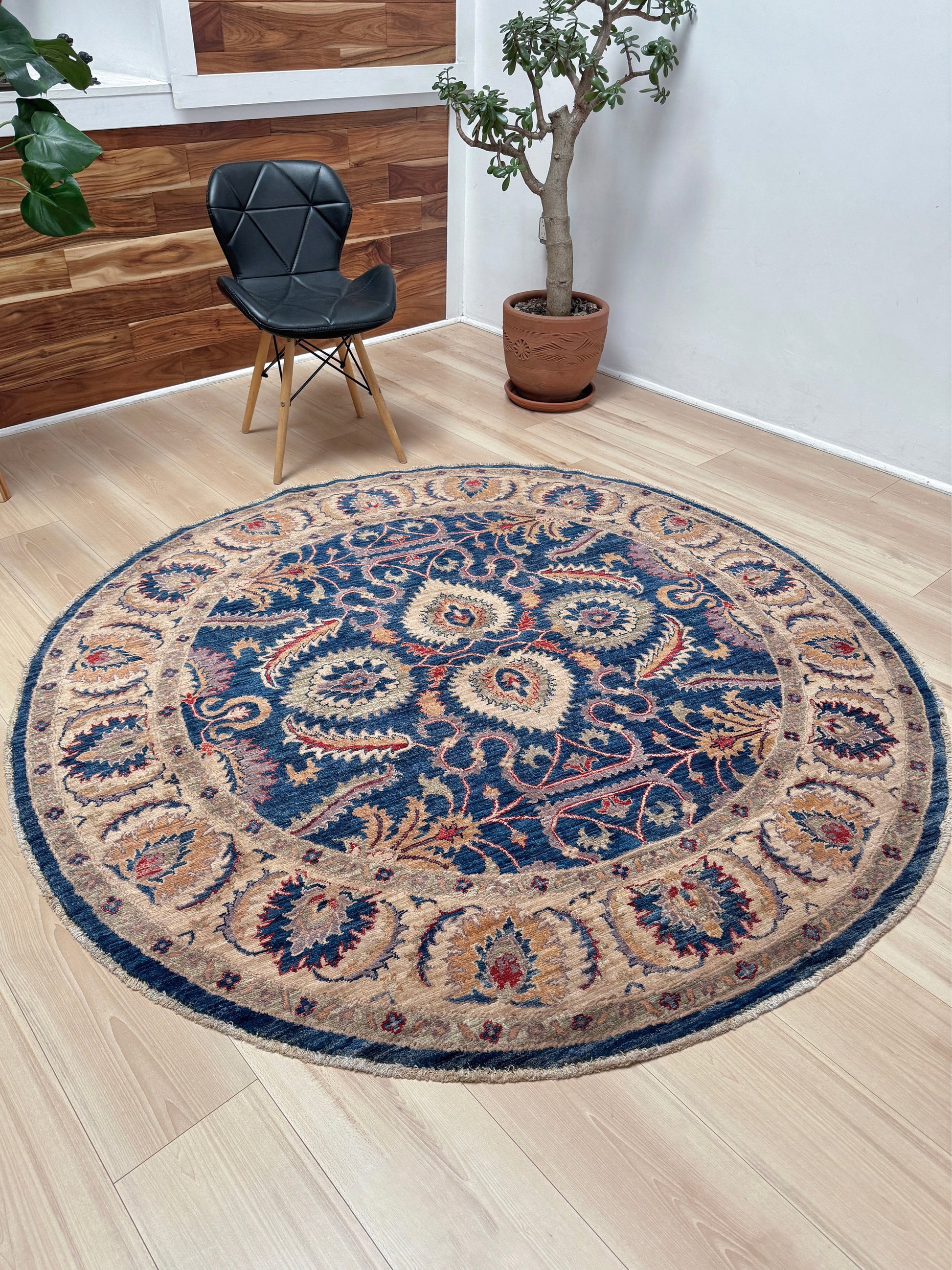 Round Oushak rug with blue field, beige border, muted gold, dusty red floral details, handmade wool 6x6 round area rug from Indigo Rugs Burlingame Bay Area.