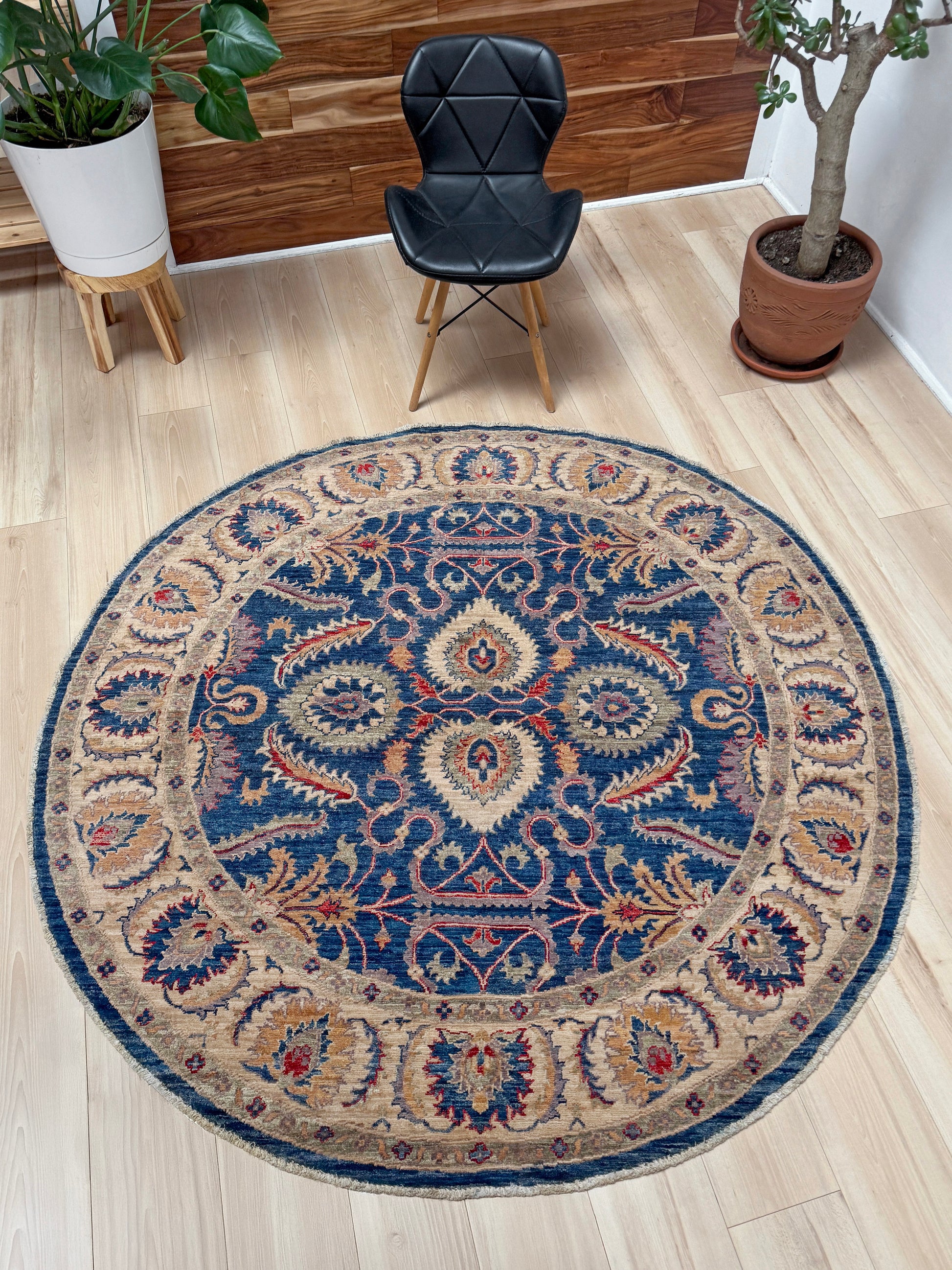 Round Oushak rug with blue field, beige border, muted gold, dusty red floral details, handmade wool 6x6 round area rug from Indigo Rugs Burlingame Bay Area.