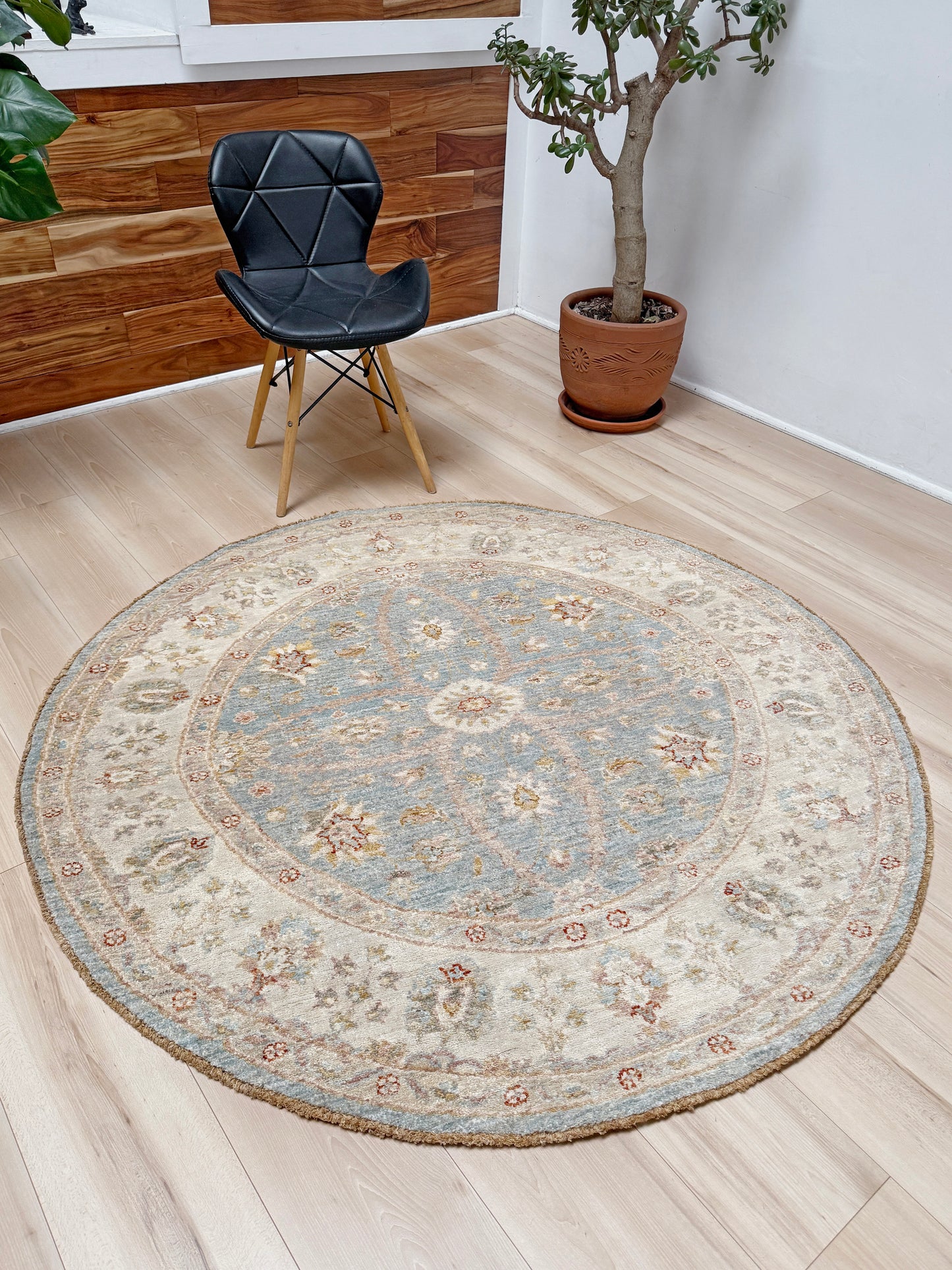Pale blue round Turkish Oushak rug with ivory, sand beige, taupe, dusty rose floral details, handmade wool 5x5 round area rug from Indigo Rugs Burlingame Bay Area.