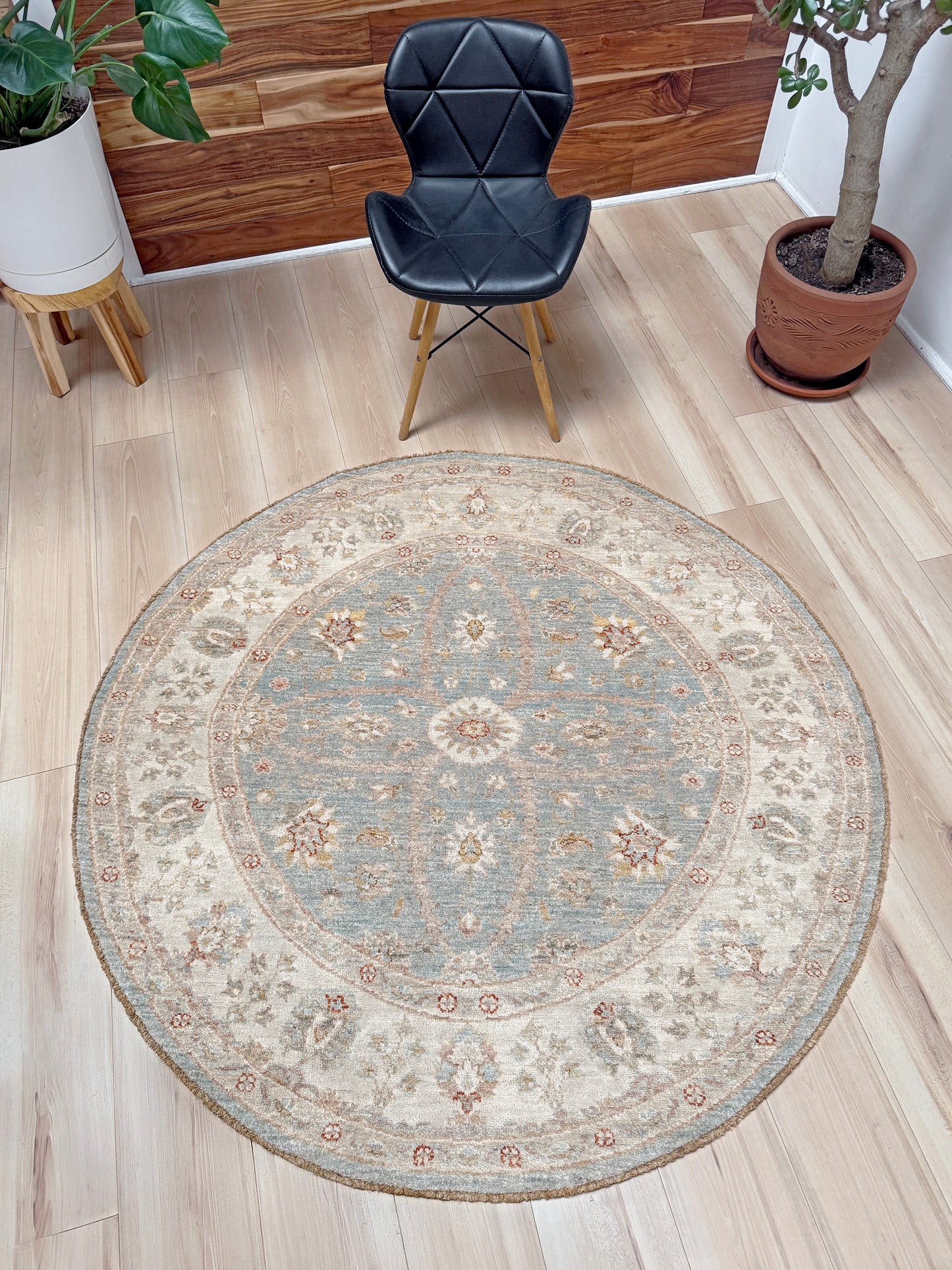 Pale blue round Turkish Oushak rug with ivory, sand beige, taupe, dusty rose floral details, handmade wool 5x5 round area rug from Indigo Rugs Burlingame Bay Area.