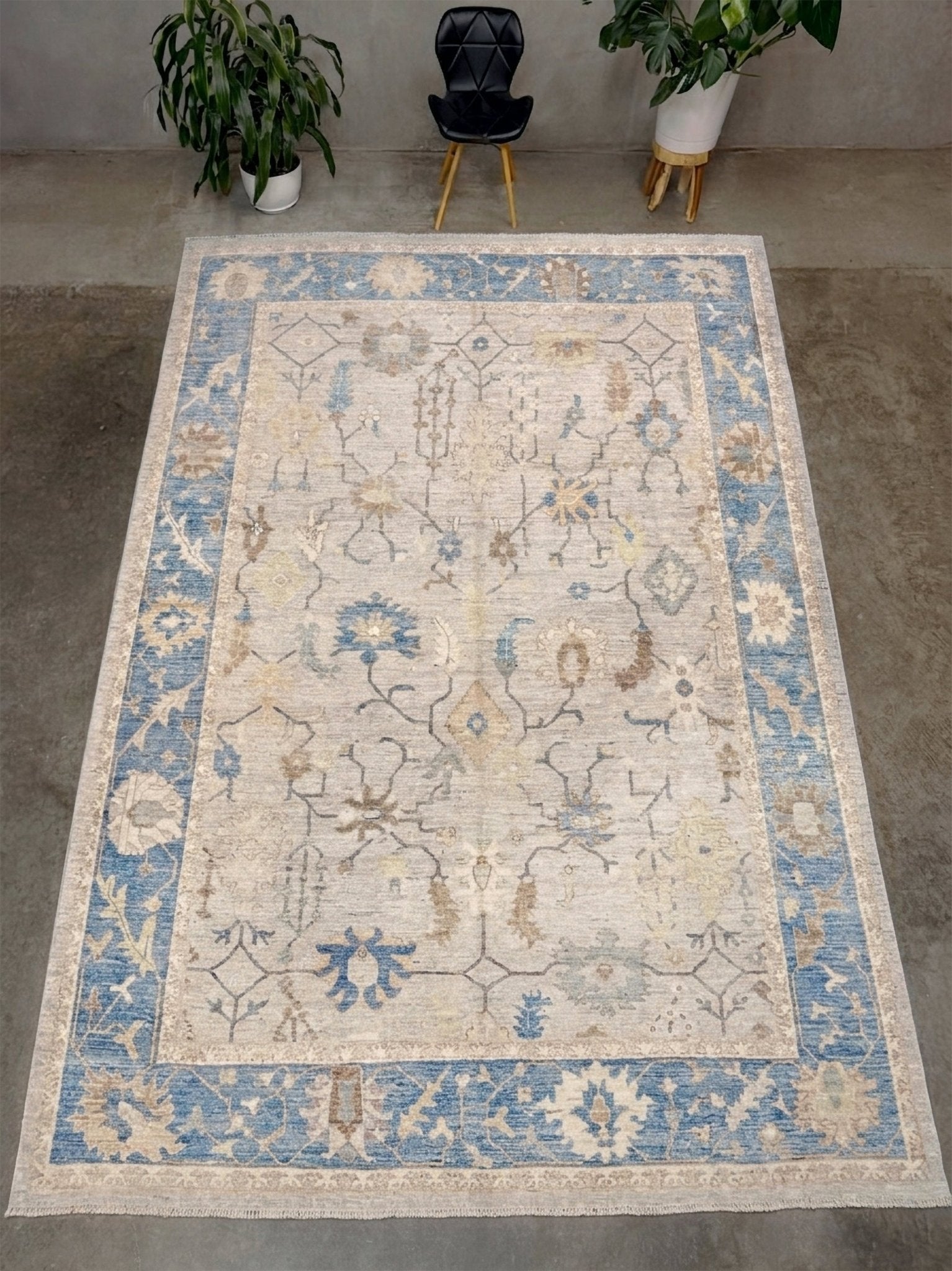 Brand new Turkish Oushak rug with soft ivory field, pale blue border, faded floral motifs, handmade wool area rug 9x12 from Indigo Rugs Burlingame Bay Area.