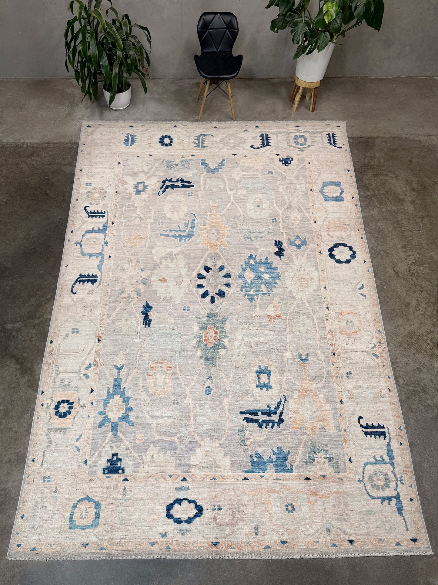 Brand new Turkish Oushak rug with pale blue field, subtle lilac undertones, soft ivory border, faded blue and peach beige accents, handmade wool area rug 9x12 from Indigo Rugs Burlingame Bay Area.