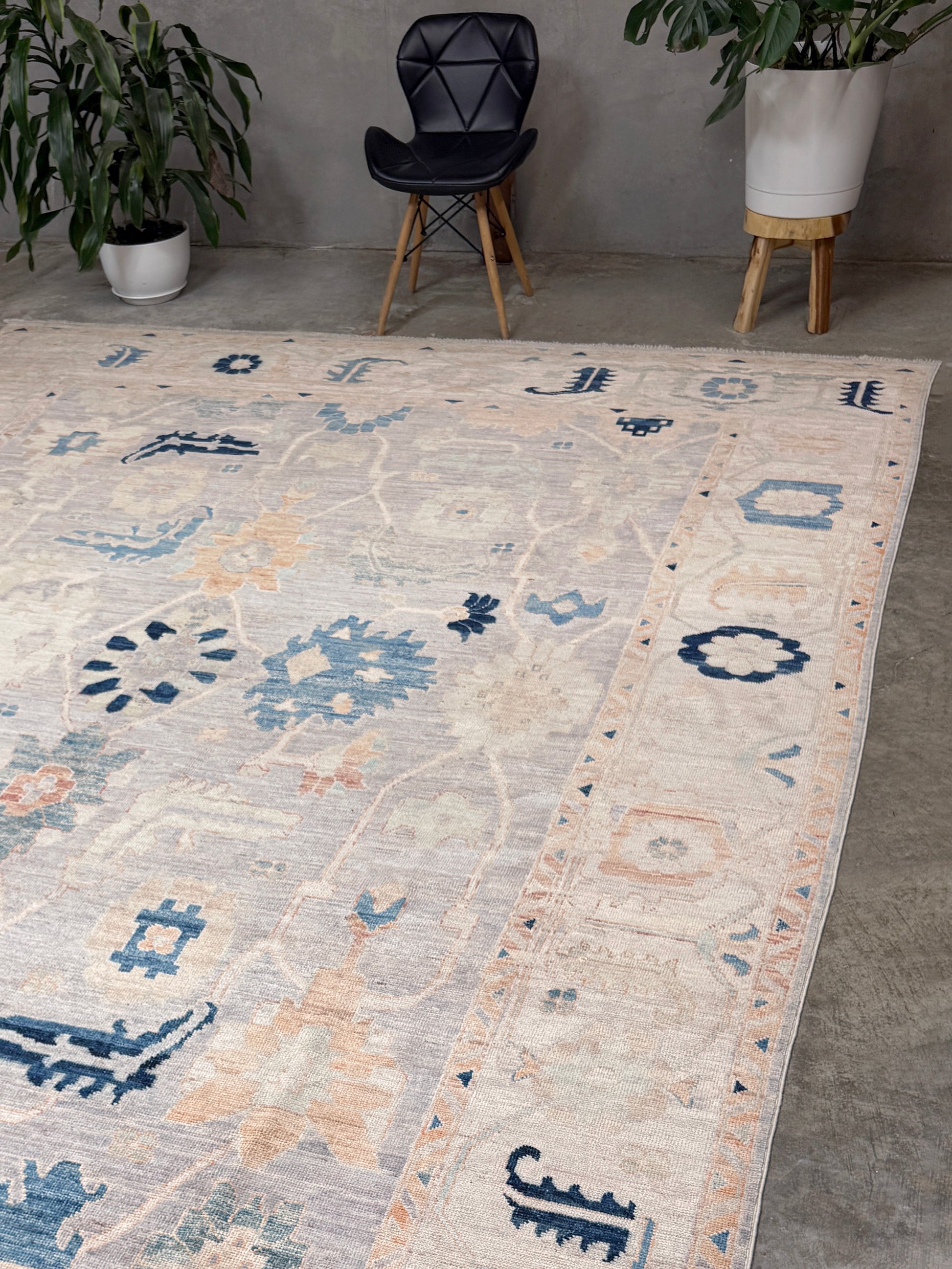 Brand new Turkish Oushak rug with pale blue field, subtle lilac undertones, soft ivory border, faded blue and peach beige accents, handmade wool area rug 9x12 from Indigo Rugs Burlingame Bay Area.