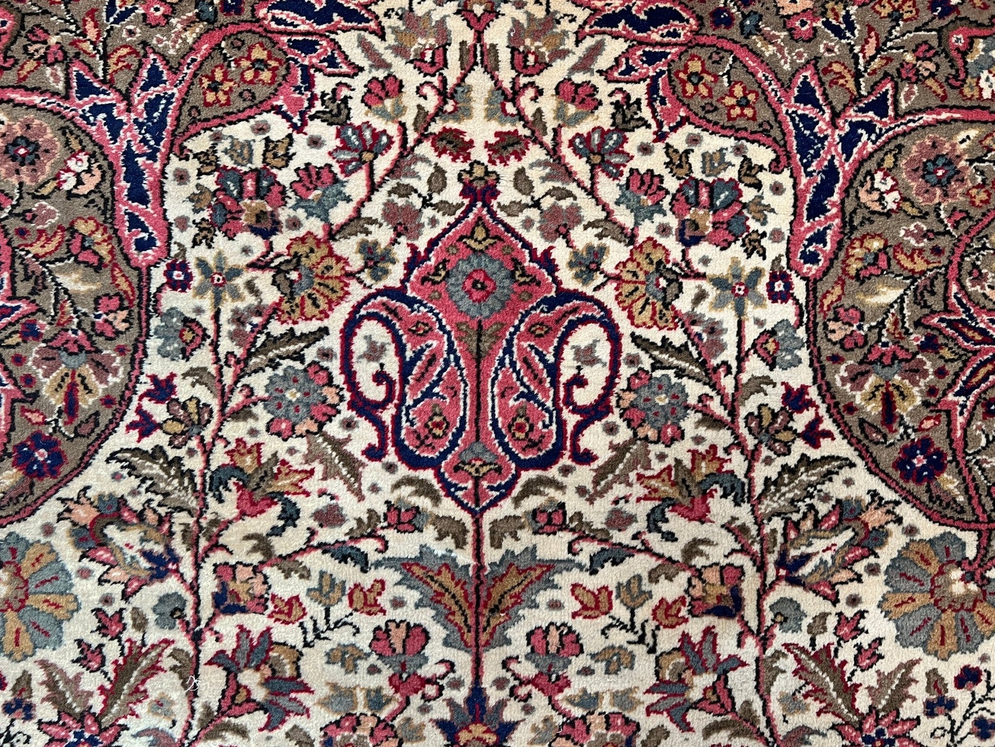 Intricate pink tulip motif detail of a floral vintage Kayseri Turkish rug. This luxurious 9x12 handmade wool carpet is available in the San Francisco Bay Area with free shipping, perfect for adding a touch of elegance to any home decor.