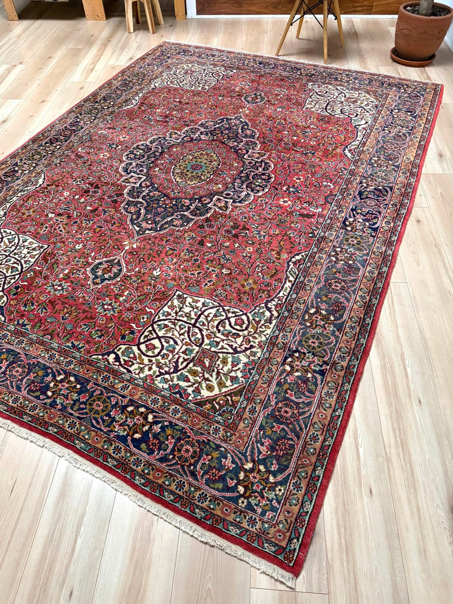 6x9 handmade Turkish rug with classic floral design in raspberry red and navy, perfect for bedroom, living room, or dining space – vintage rug with rich character from best rug shop in San Mateo, SF Bay Area, free shipping.