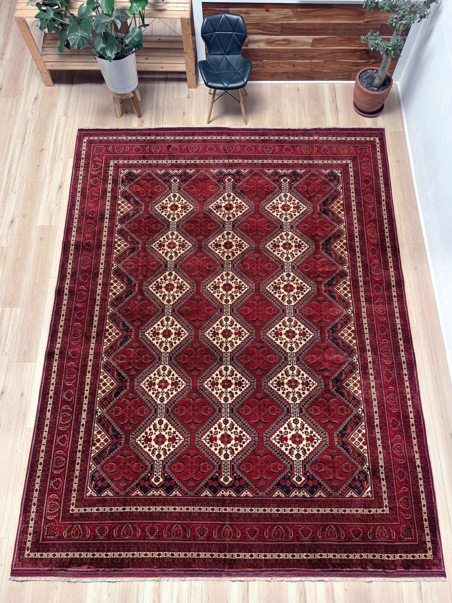 Deep crimson Khal Mohammadi Afghan rug with classic Turkmen gul medallions, dark navy border, ivory details, burgundy, terracotta, beige and forest green accents, handmade Merino wool 10x14 from Indigo Rugs Burlingame Bay Area.