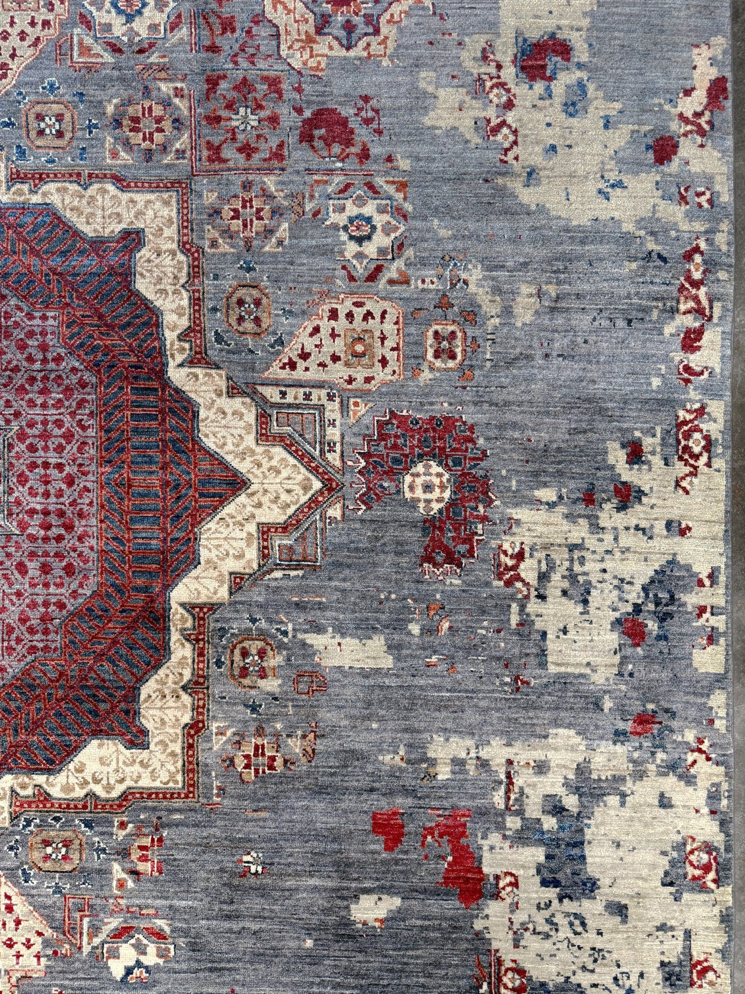 Transitional erased modern Mamluk design rug in 9x12 size with crimson medallion, silvery gray background, and ivory accents — perfect for living rooms, dining rooms, or bedrooms. Handmade wool rug from Indigo Rugs, Burlingame SF Bay Area with free shipping.