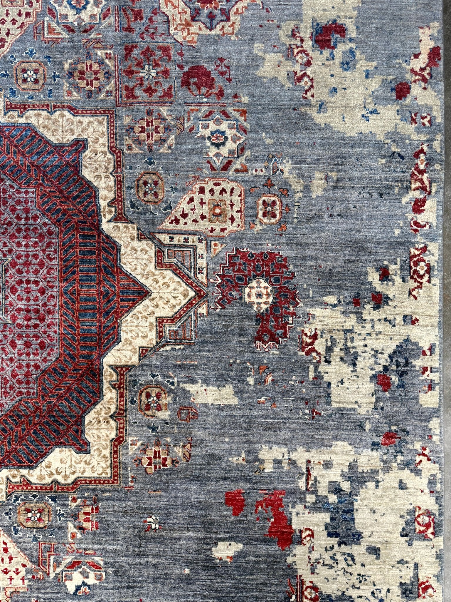 Transitional erased modern Mamluk design rug in 9x12 size with crimson medallion, silvery gray background, and ivory accents — perfect for living rooms, dining rooms, or bedrooms. Handmade wool rug from Indigo Rugs, Burlingame SF Bay Area with free shipping.