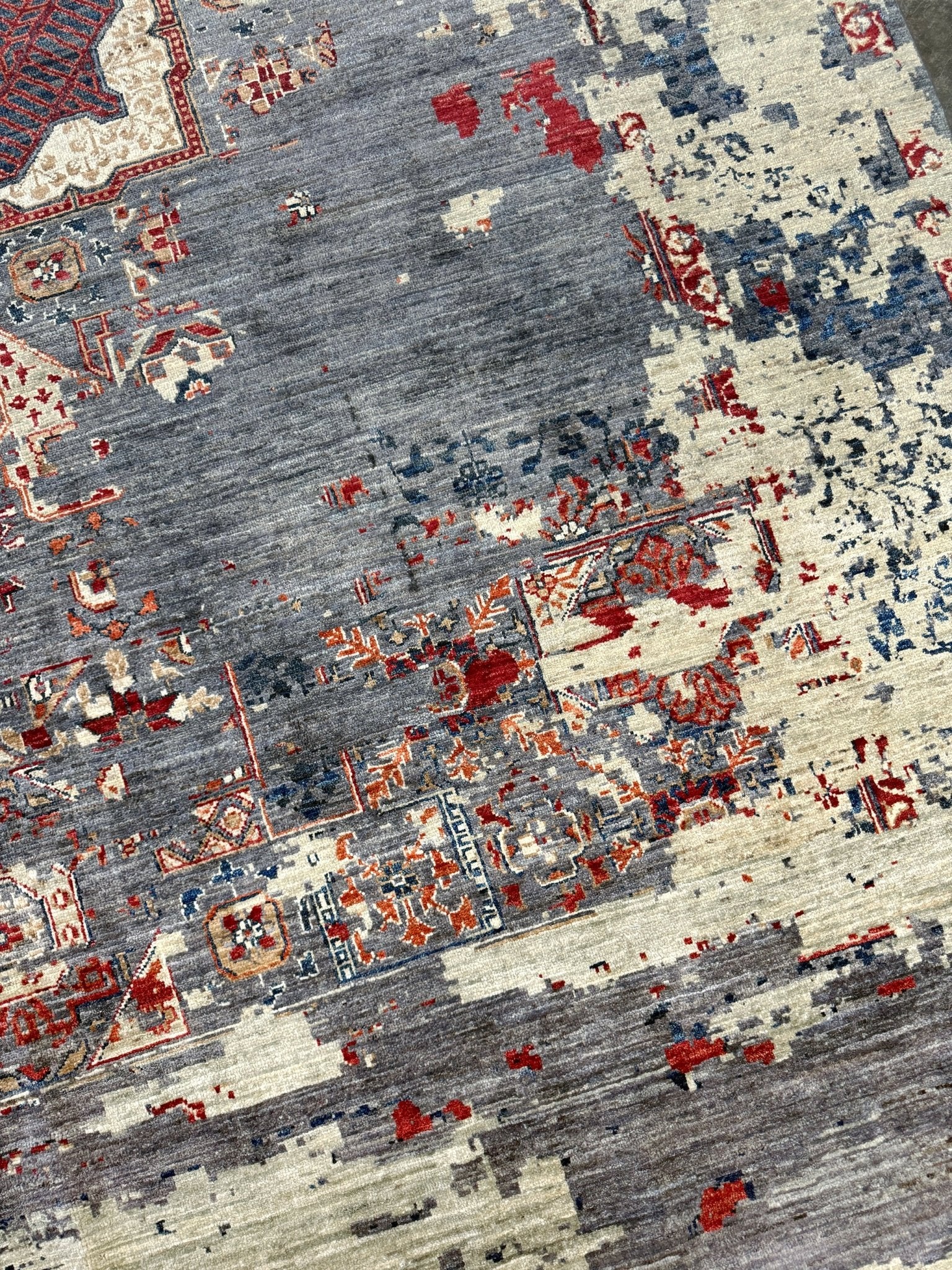 Transitional erased modern Mamluk design rug in 9x12 size with crimson medallion, silvery gray background, and ivory accents — perfect for living rooms, dining rooms, or bedrooms. Handmade wool rug from Indigo Rugs, Burlingame SF Bay Area with free shipping.