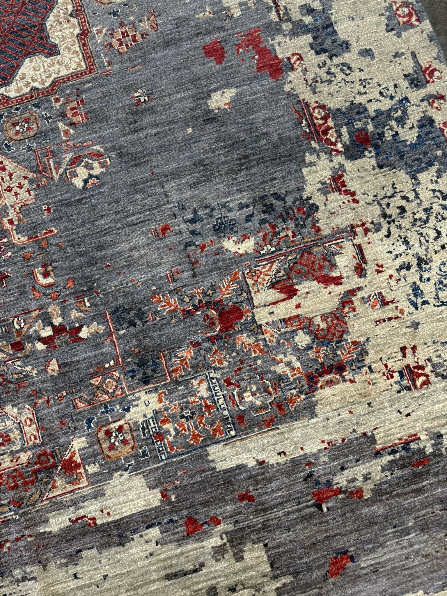 Transitional erased modern Mamluk design rug in 9x12 size with crimson medallion, silvery gray background, and ivory accents — perfect for living rooms, dining rooms, or bedrooms. Handmade wool rug from Indigo Rugs, Burlingame SF Bay Area with free shipping.