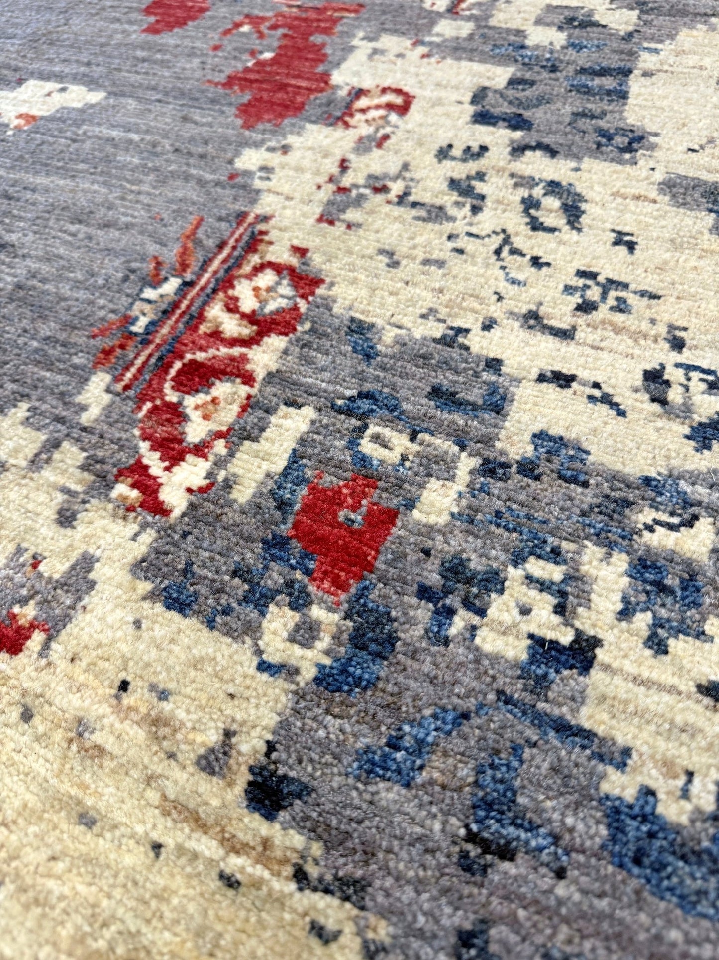 Transitional erased modern Mamluk design rug in 9x12 size with crimson medallion, silvery gray background, and ivory accents — perfect for living rooms, dining rooms, or bedrooms. Handmade wool rug from Indigo Rugs, Burlingame SF Bay Area with free shipping.