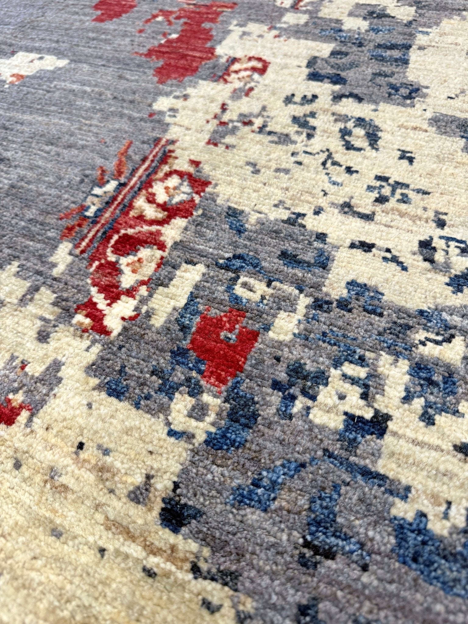 Transitional erased modern Mamluk design rug in 9x12 size with crimson medallion, silvery gray background, and ivory accents — perfect for living rooms, dining rooms, or bedrooms. Handmade wool rug from Indigo Rugs, Burlingame SF Bay Area with free shipping.