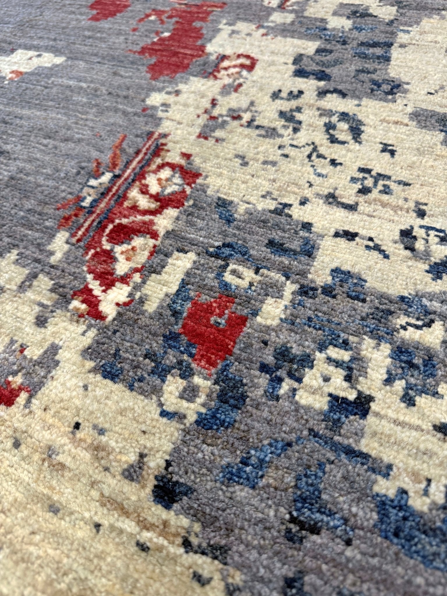 Transitional erased modern Mamluk design rug in 9x12 size with crimson medallion, silvery gray background, and ivory accents — perfect for living rooms, dining rooms, or bedrooms. Handmade wool rug from Indigo Rugs, Burlingame SF Bay Area with free shipping.