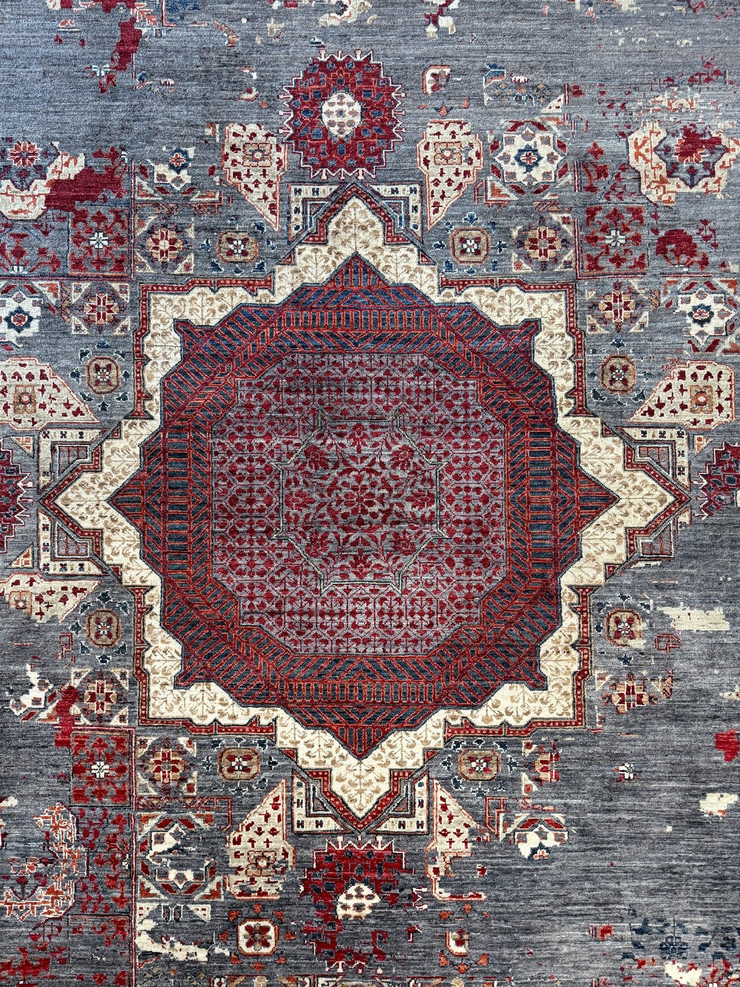 Transitional erased modern Mamluk design rug in 9x12 size with crimson medallion, silvery gray background, and ivory accents — perfect for living rooms, dining rooms, or bedrooms. Handmade wool rug from Indigo Rugs, Burlingame SF Bay Area with free shipping.