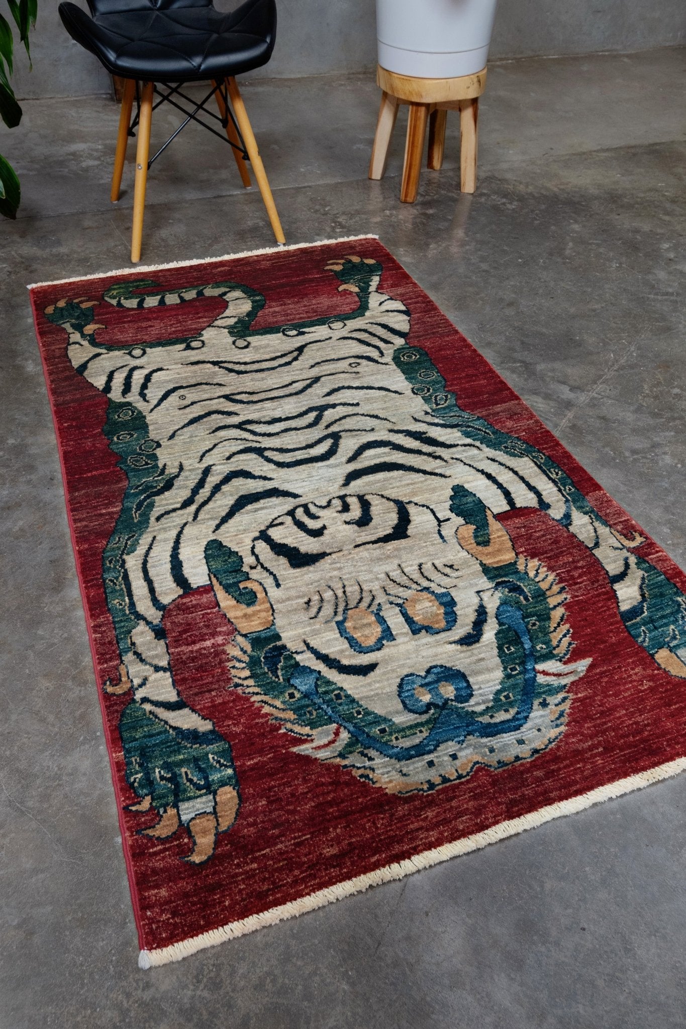 Brand new Tibetan tiger rug with rust red, ivory tiger, teal blue, handmade wool accent rug 3x5 from Indigo Rugs Burlingame Bay Area.