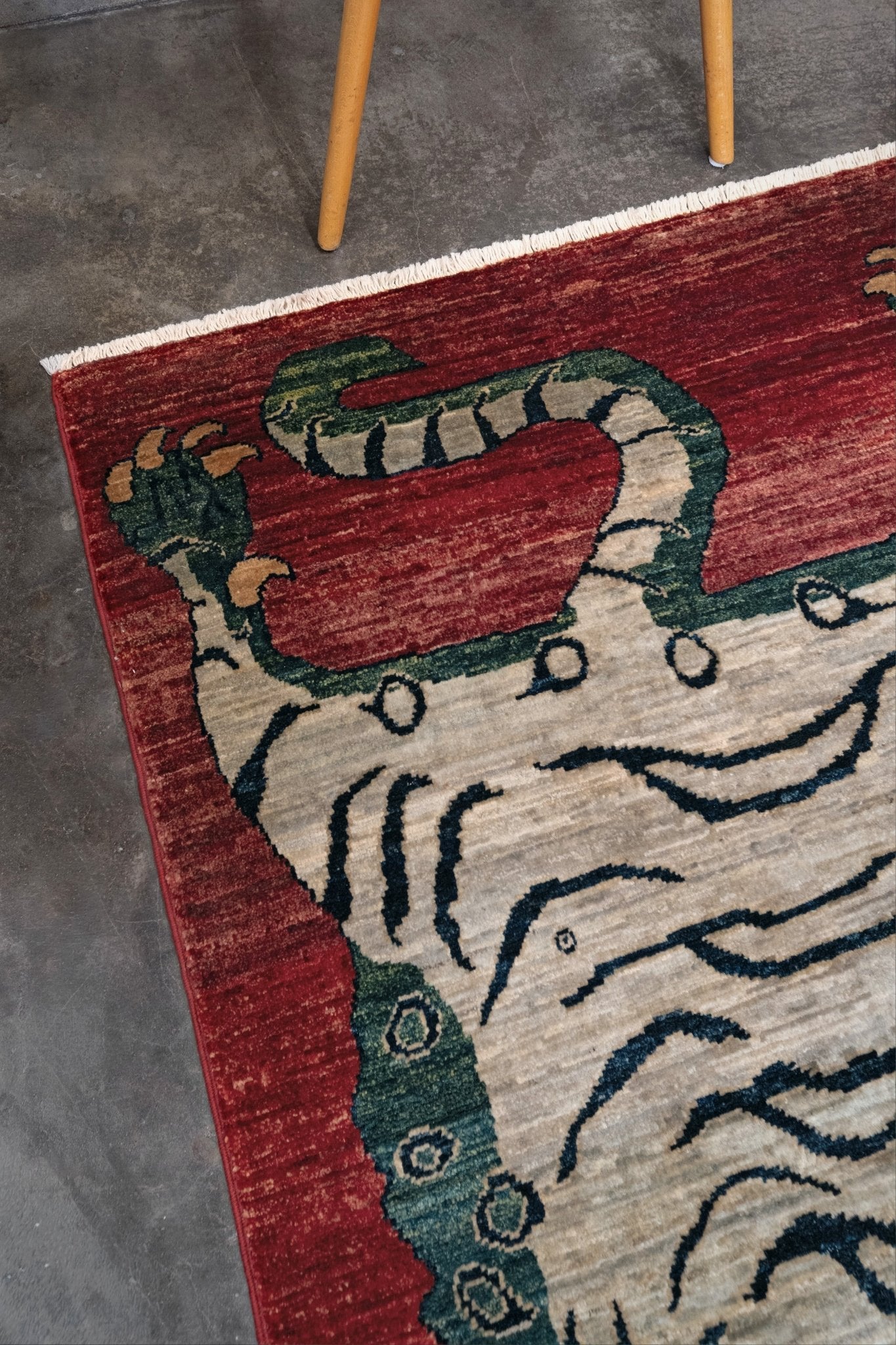 Brand new Tibetan tiger rug with rust red, ivory tiger, teal blue, handmade wool accent rug 3x5 from Indigo Rugs Burlingame Bay Area.