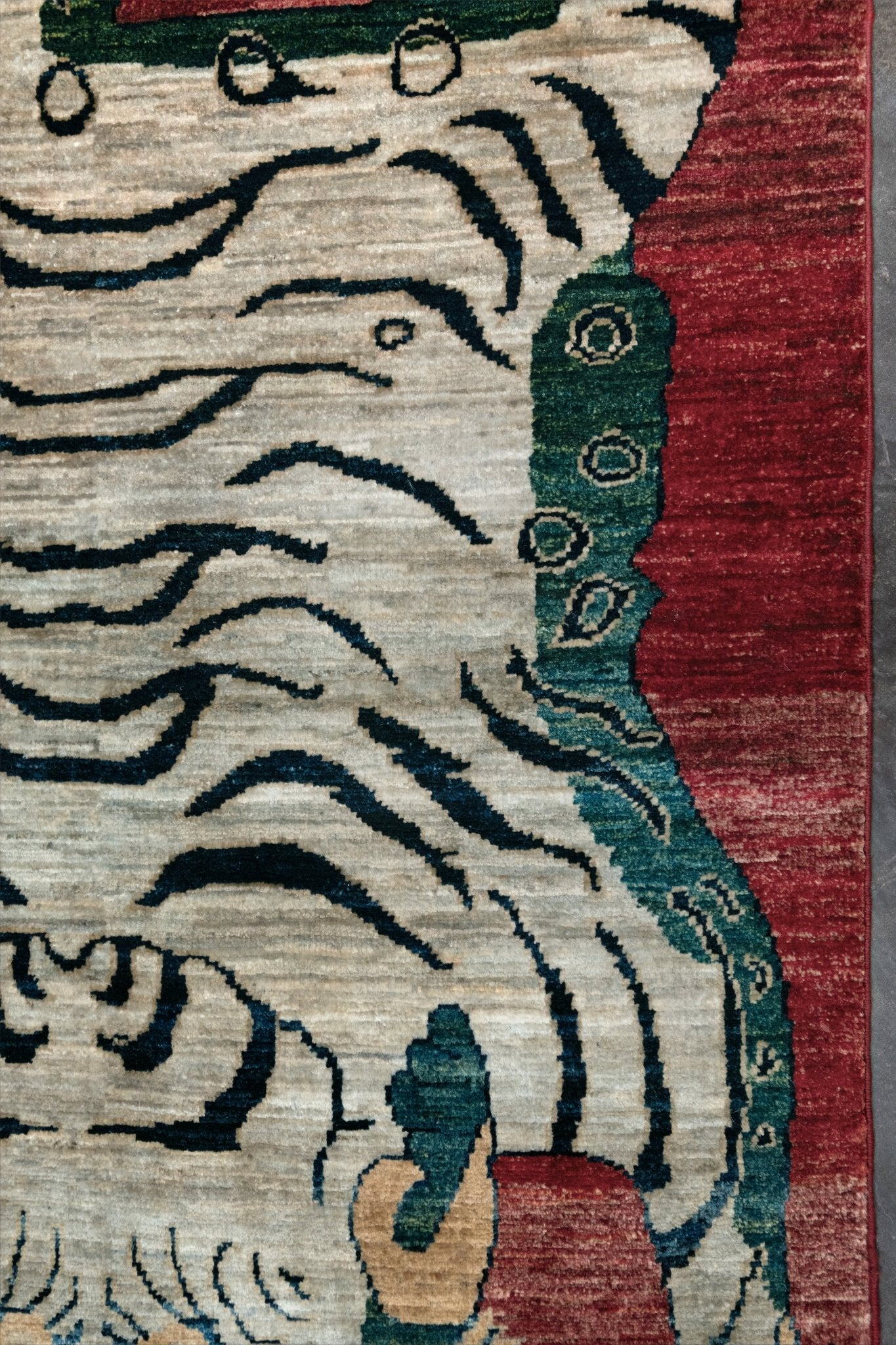 Brand new Tibetan tiger rug with rust red, ivory tiger, teal blue, handmade wool accent rug 3x5 from Indigo Rugs Burlingame Bay Area.