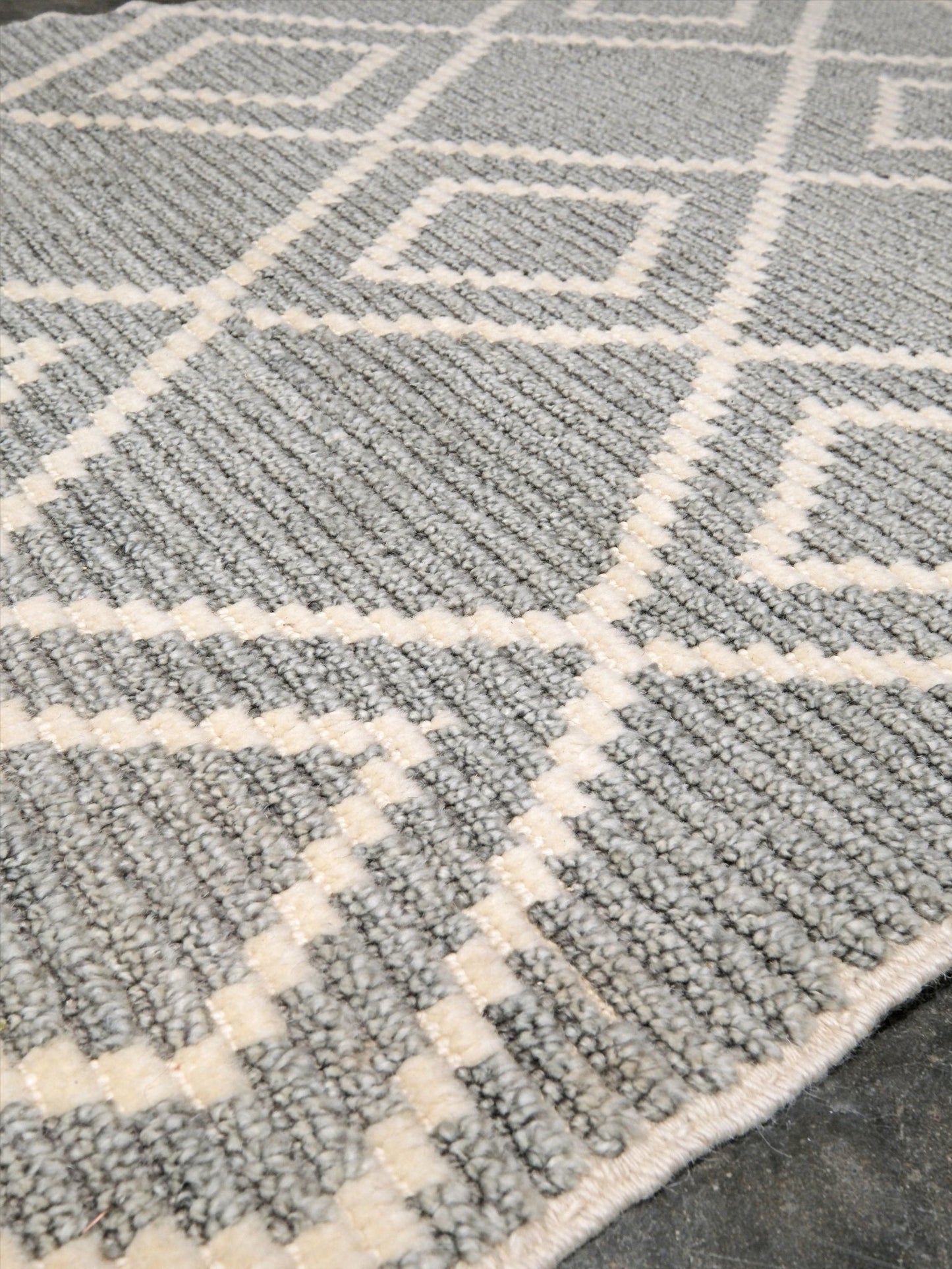 Small gray Turkish Tulu rug with ivory geometric diamond pattern, handmade wool rug, 4x6 from Indigo Rugs Burlingame Bay Area.