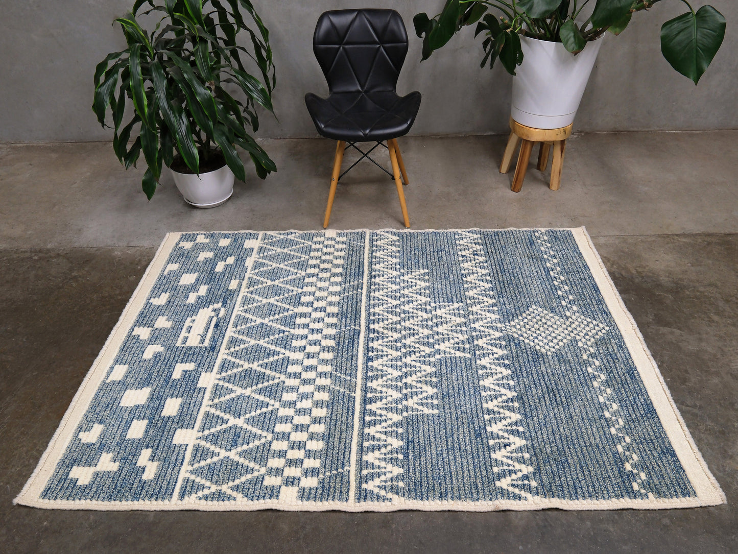 Small blue Turkish Tulu rug with ivory geometric motifs, checker details and textured wool pile, handmade wool rug 4x6 from Indigo Rugs Burlingame Bay Area.