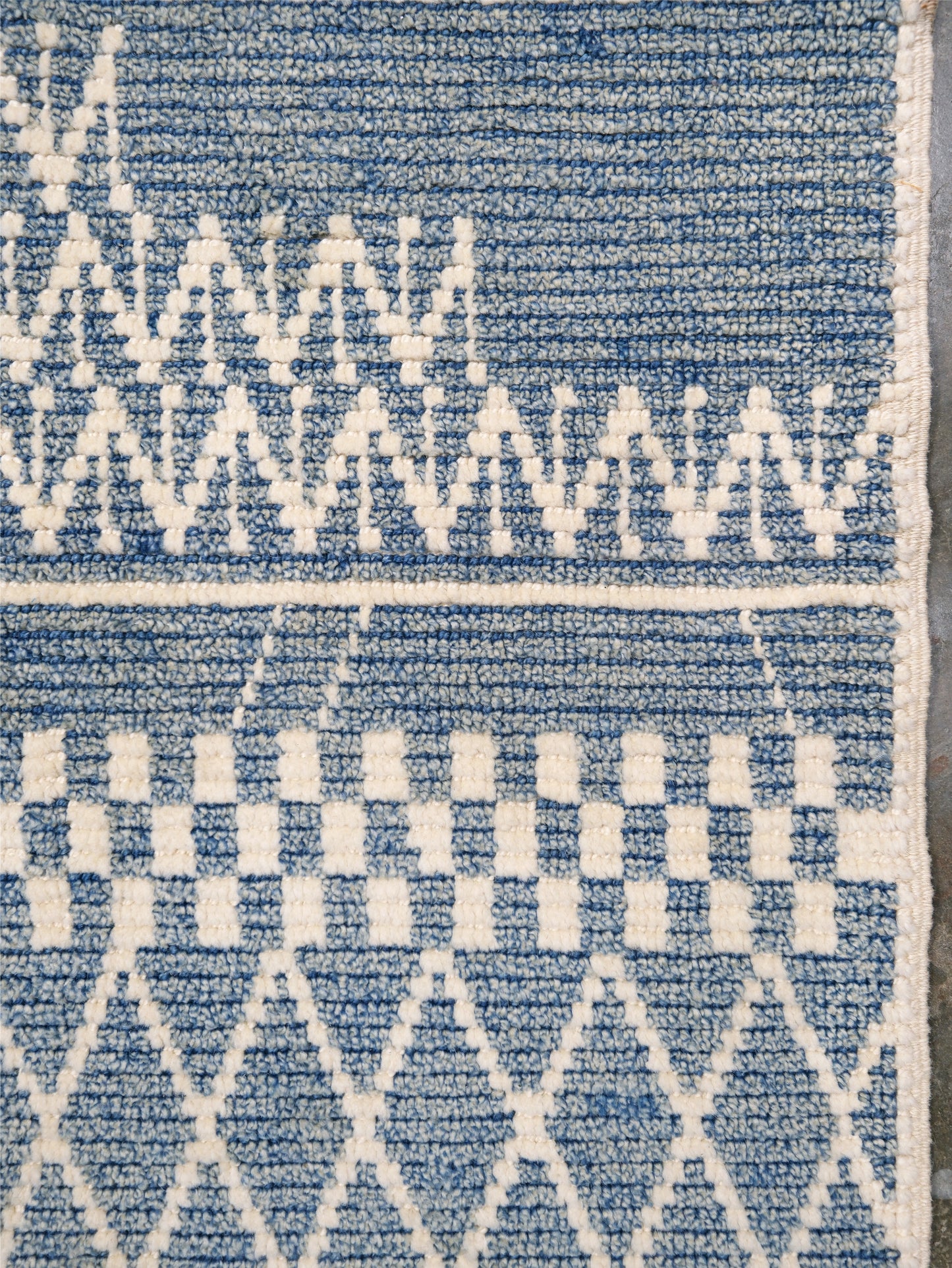 Small blue Turkish Tulu rug with ivory geometric motifs, checker details and textured wool pile, handmade wool rug 4x6 from Indigo Rugs Burlingame Bay Area.