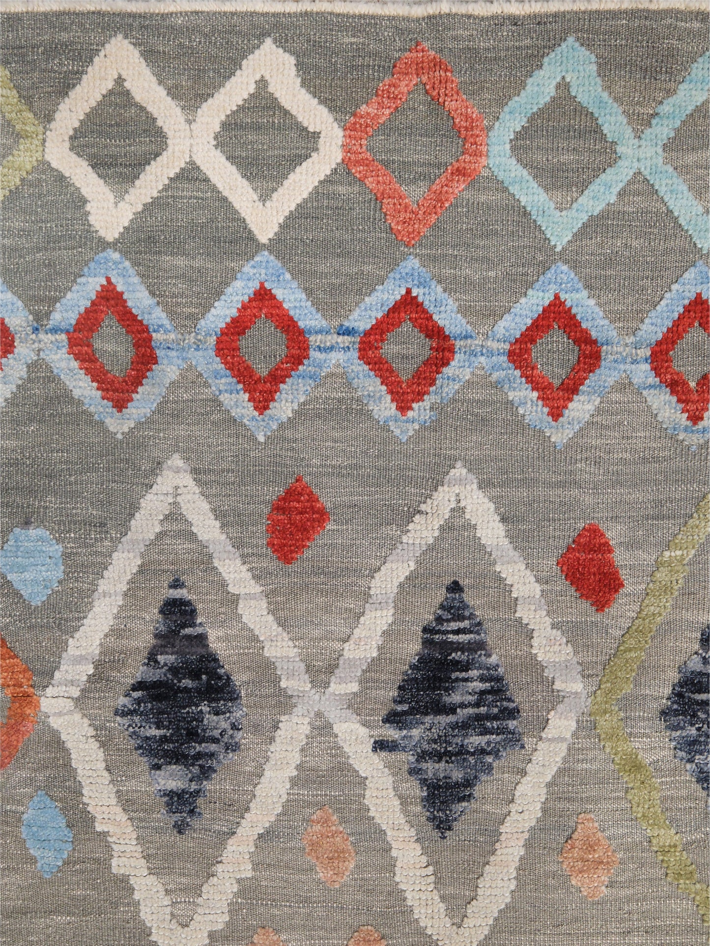 Warm gray vibrant modern Turkish Tulu rug with colorful raised diamond motifs, 3D wool pile texture, handmade wool area rug 9x12 from Indigo Rugs Burlingame Bay Area.