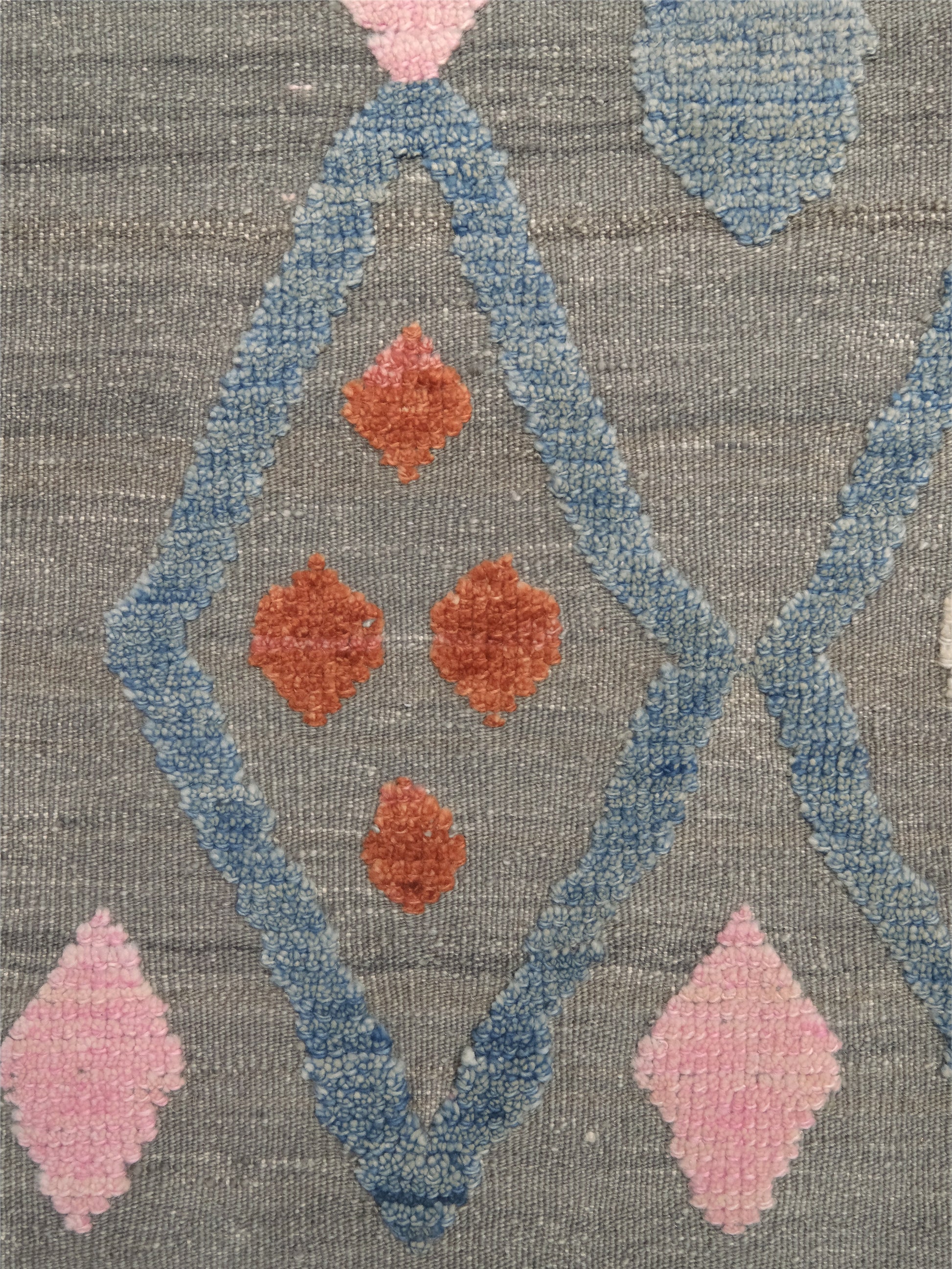 Warm gray vibrant modern Turkish Tulu rug with colorful raised diamond motifs, 3D wool pile texture, handmade wool area rug 9x12 from Indigo Rugs Burlingame Bay Area.