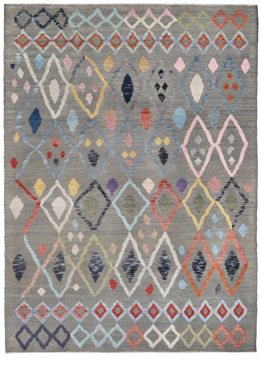 Multicolored geometric patterned rug on a plain background. Warm gray vibrant modern Turkish Tulu rug with colorful raised diamond motifs, 3D wool pile texture, handmade wool area rug 9x12 from Indigo Rugs Burlingame Bay Area.