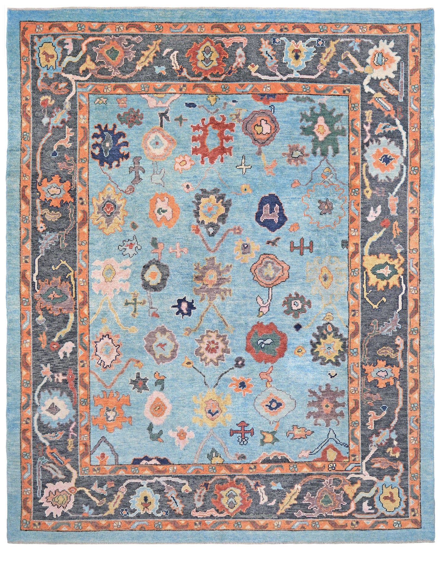 Pale turquoise Turkish Oushak rug with charcoal border, coral orange framing, and colorful abstract floral motifs, hand-knotted wool 8x10 area rug from Indigo Rugs Burlingame Bay Area.