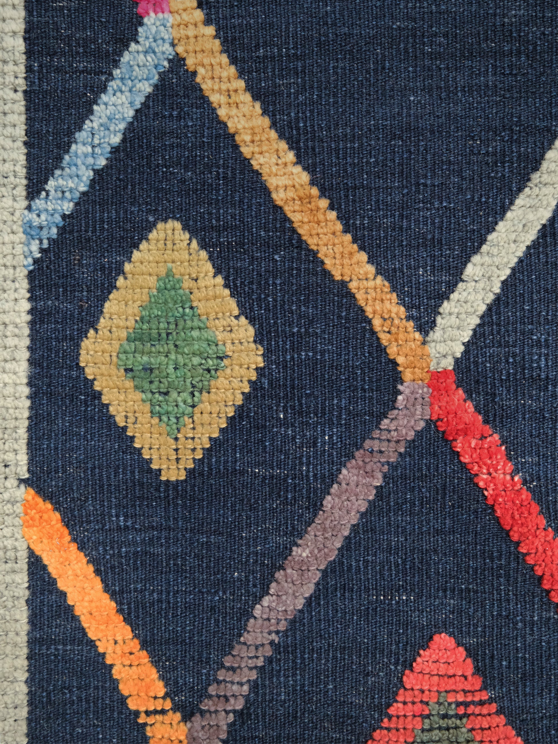 Modern Vibrant Turkish Tulu handmade wool a geometric patterned area rug 9x12 from Indigo Rugs Burlingame Bay Area.